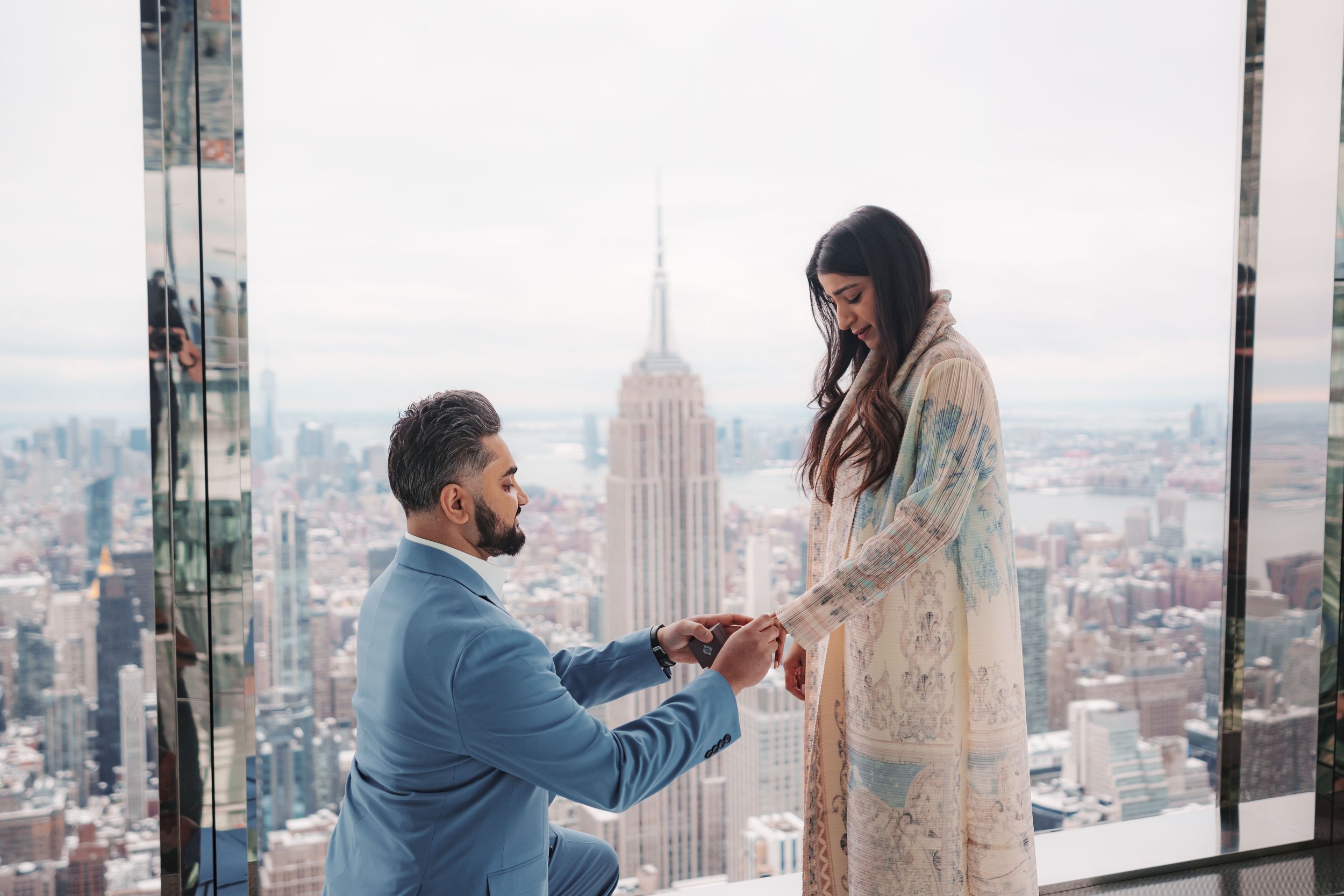 A beautiful marriage proposal and engagement photoshoot at SUMMIT One Vanderbilt in New York City captured by Matt Ritchie