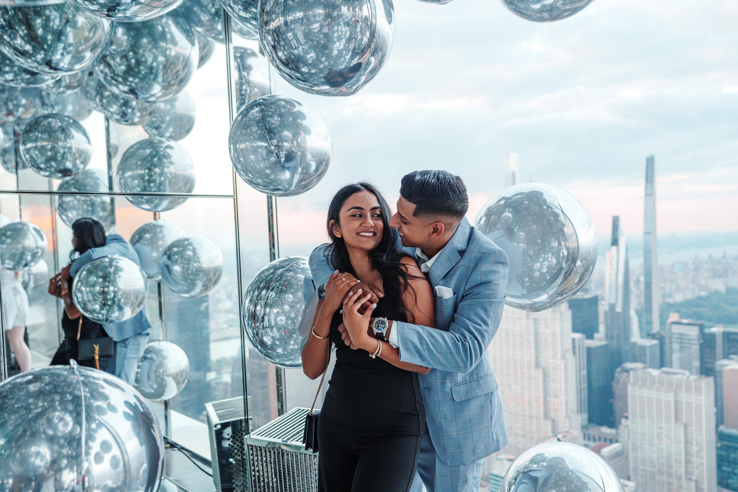 A beautiful marriage proposal and engagement photoshoot at SUMMIT One Vanderbilt in New York City captured by Matt Ritchie