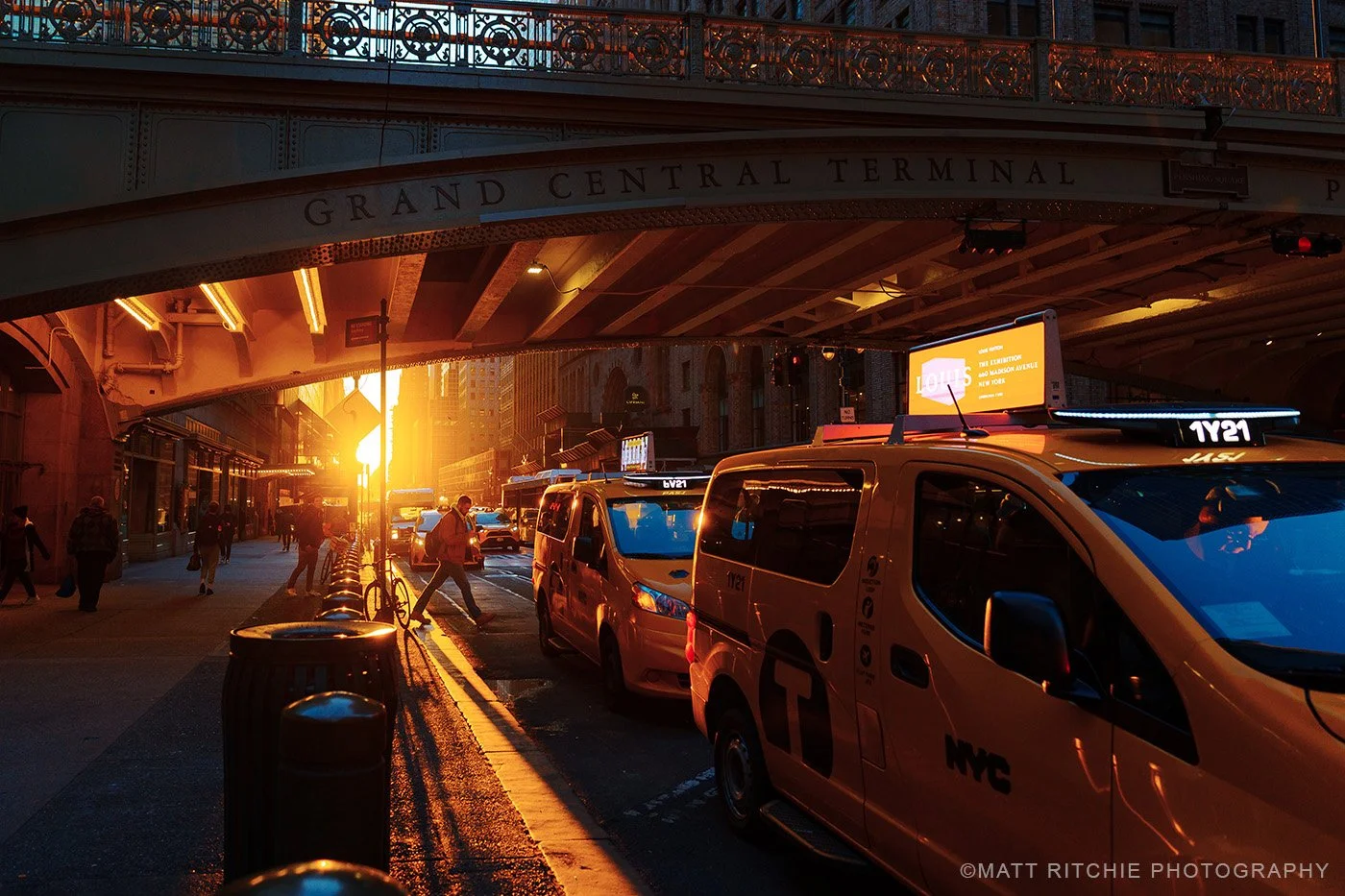 Reverse Manhattanhenge viewed from a Manhattan street as the sun aligns with the buildings