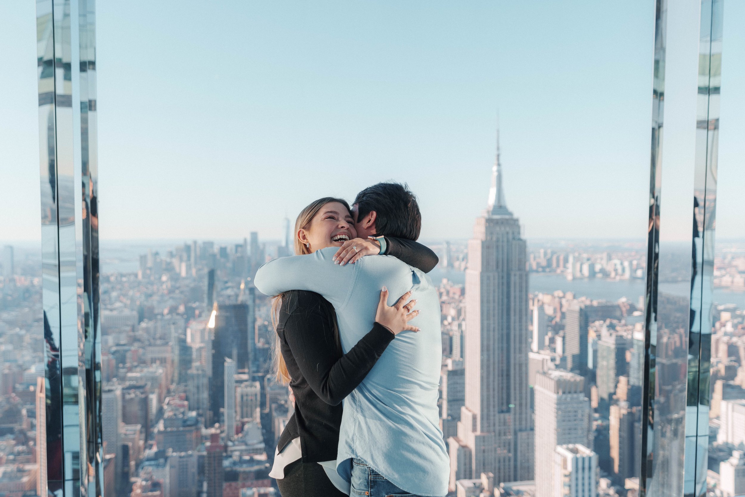 A beautiful marriage proposal and engagement photoshoot at SUMMIT One Vanderbilt in New York City captured by Matt Ritchie