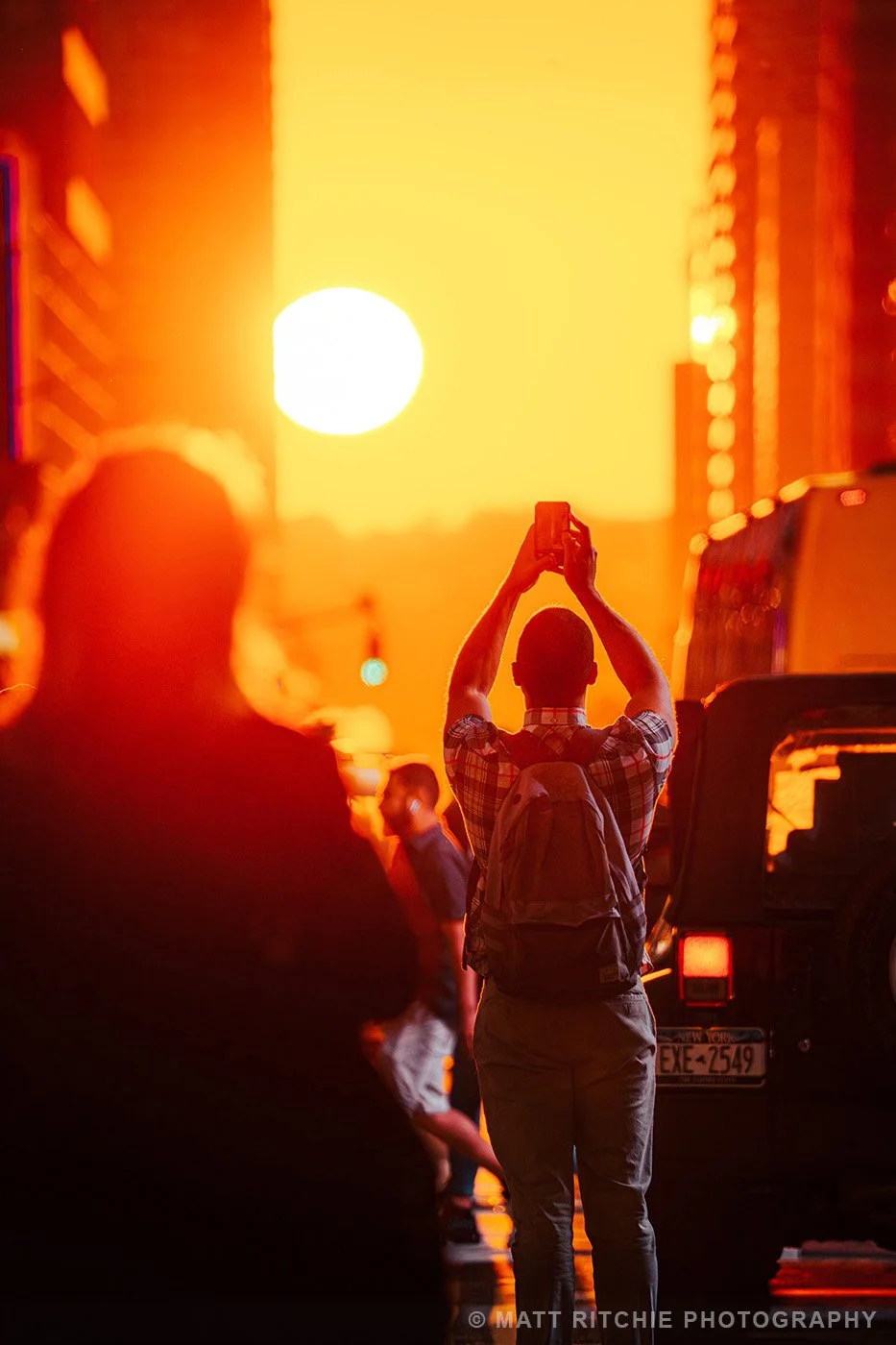 Manhattanhenge during a summer sunset in New York City