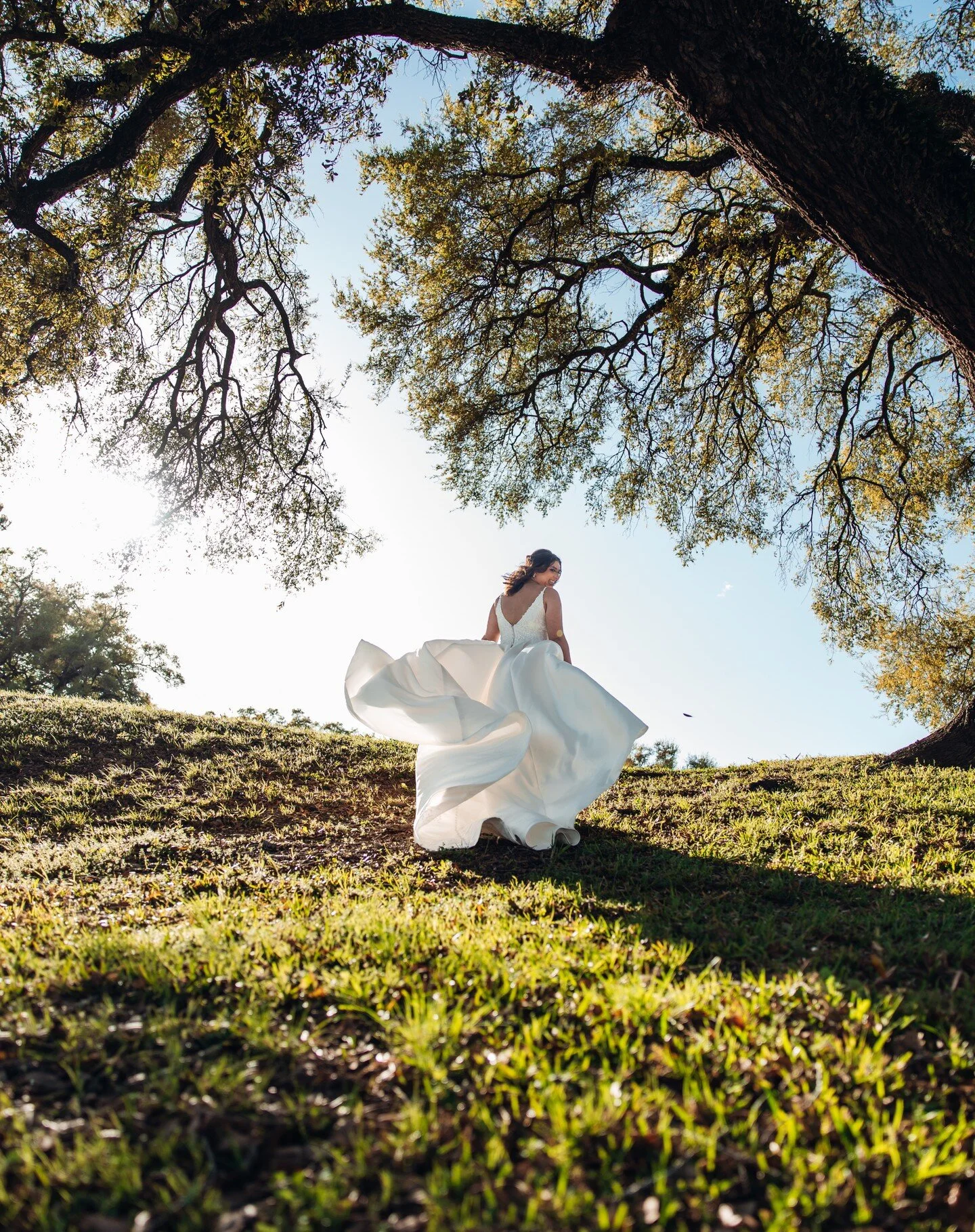 Hey Allison, remember that time we were taking your bridals on top of a hill in hurricane force winds, your veil flew off and I caught it with my face, and Neil slid down the side of the hill superhero style forever staining his favorite jeans?

Well