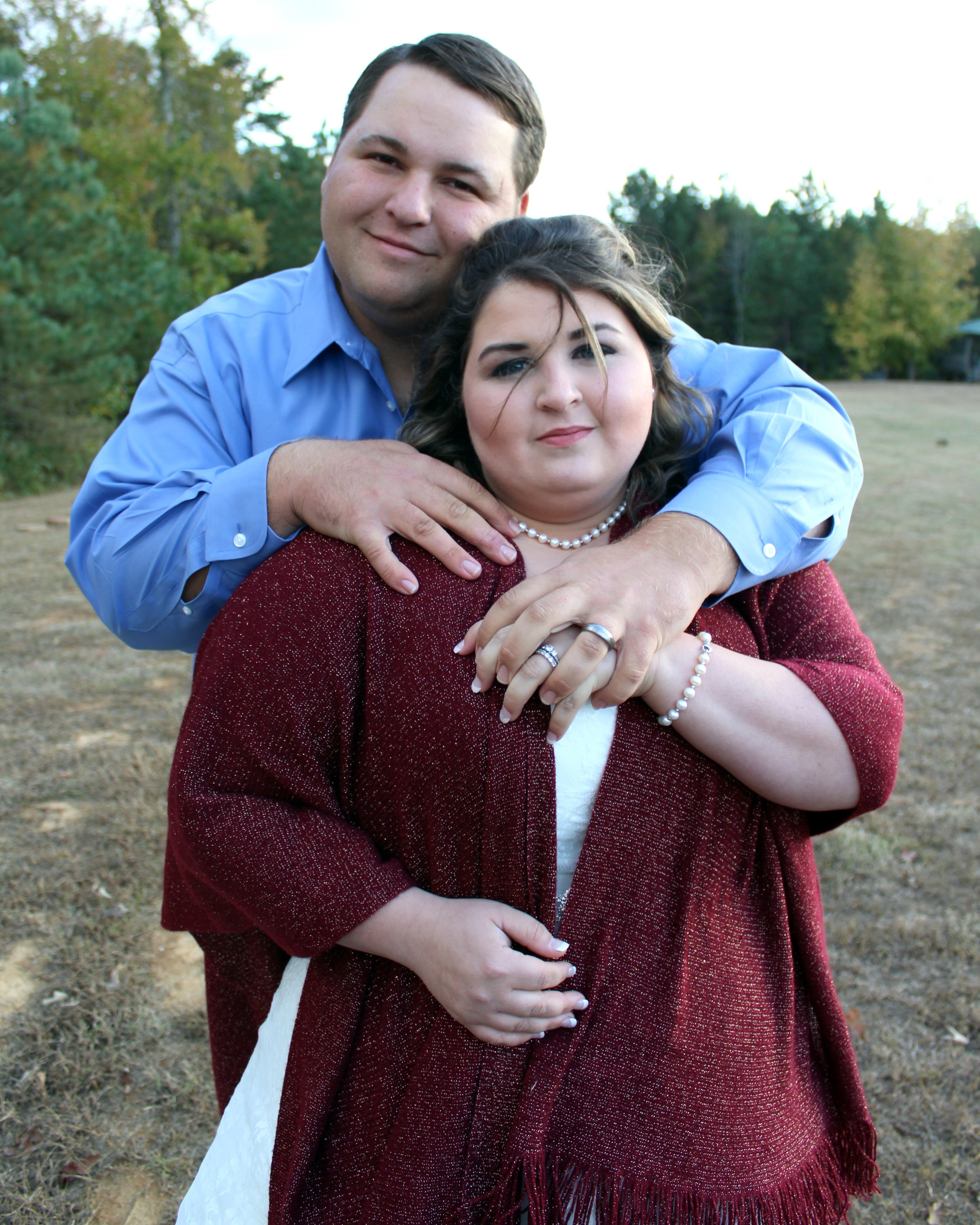 Mr. and Mrs. Taylor Holding Hands.jpg
