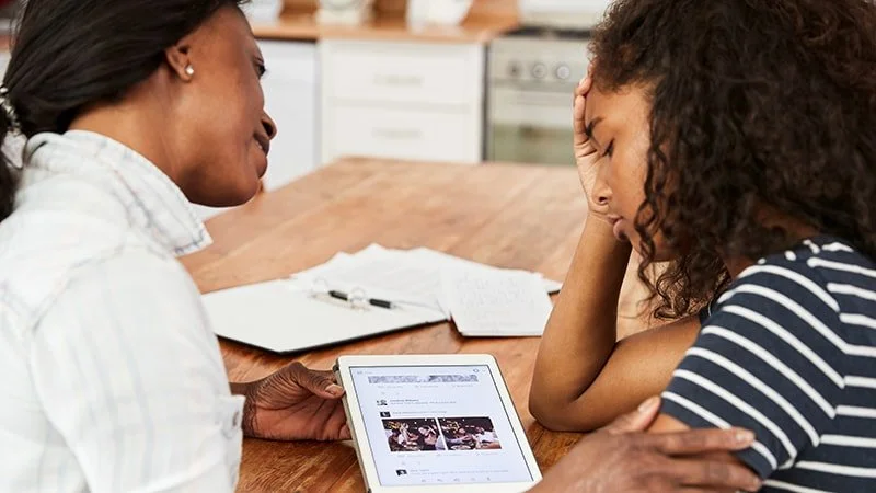 Donald Trump standing in front of the United States Supreme Court building.