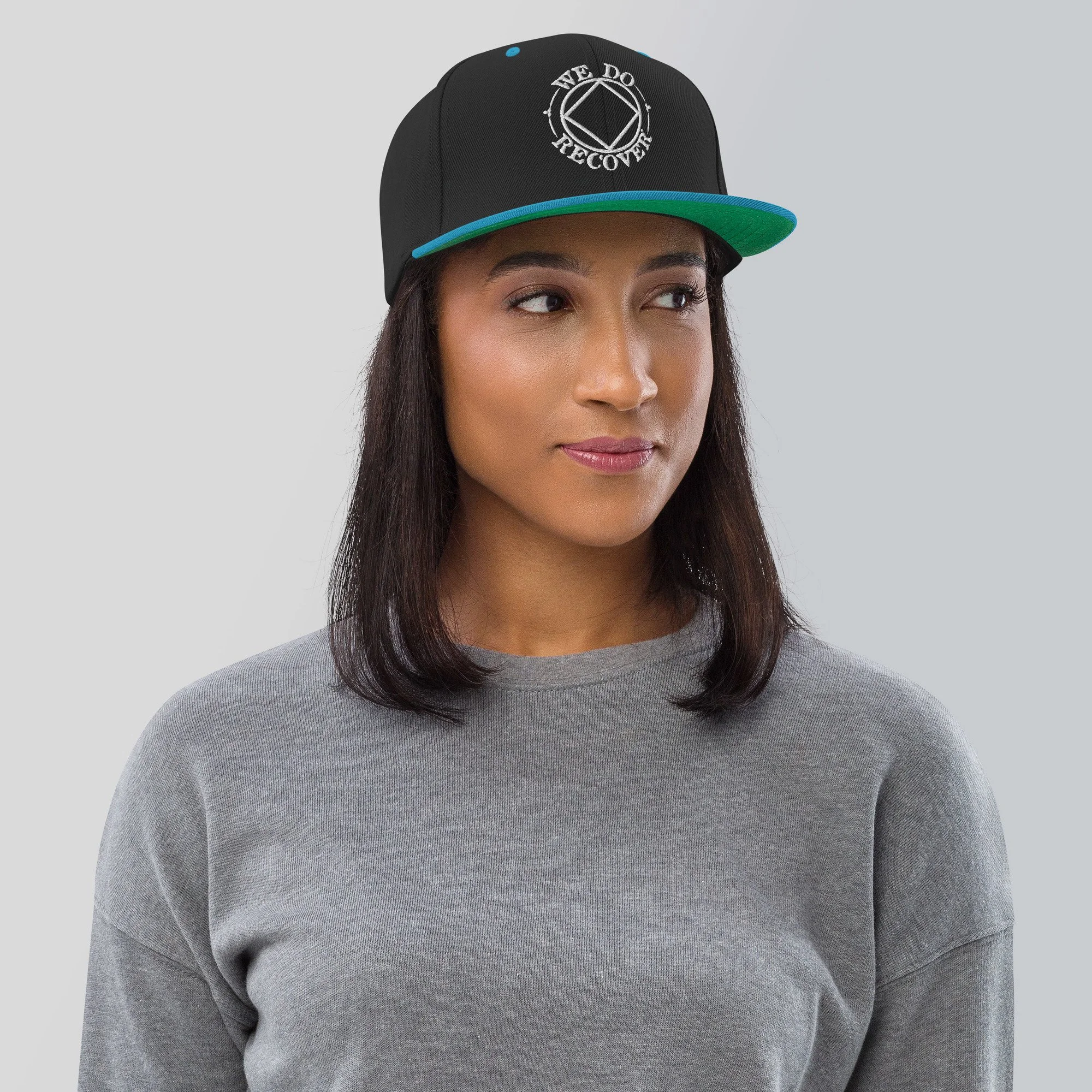 classic-snapback-black-teal-front-65f21137613ae.jpg