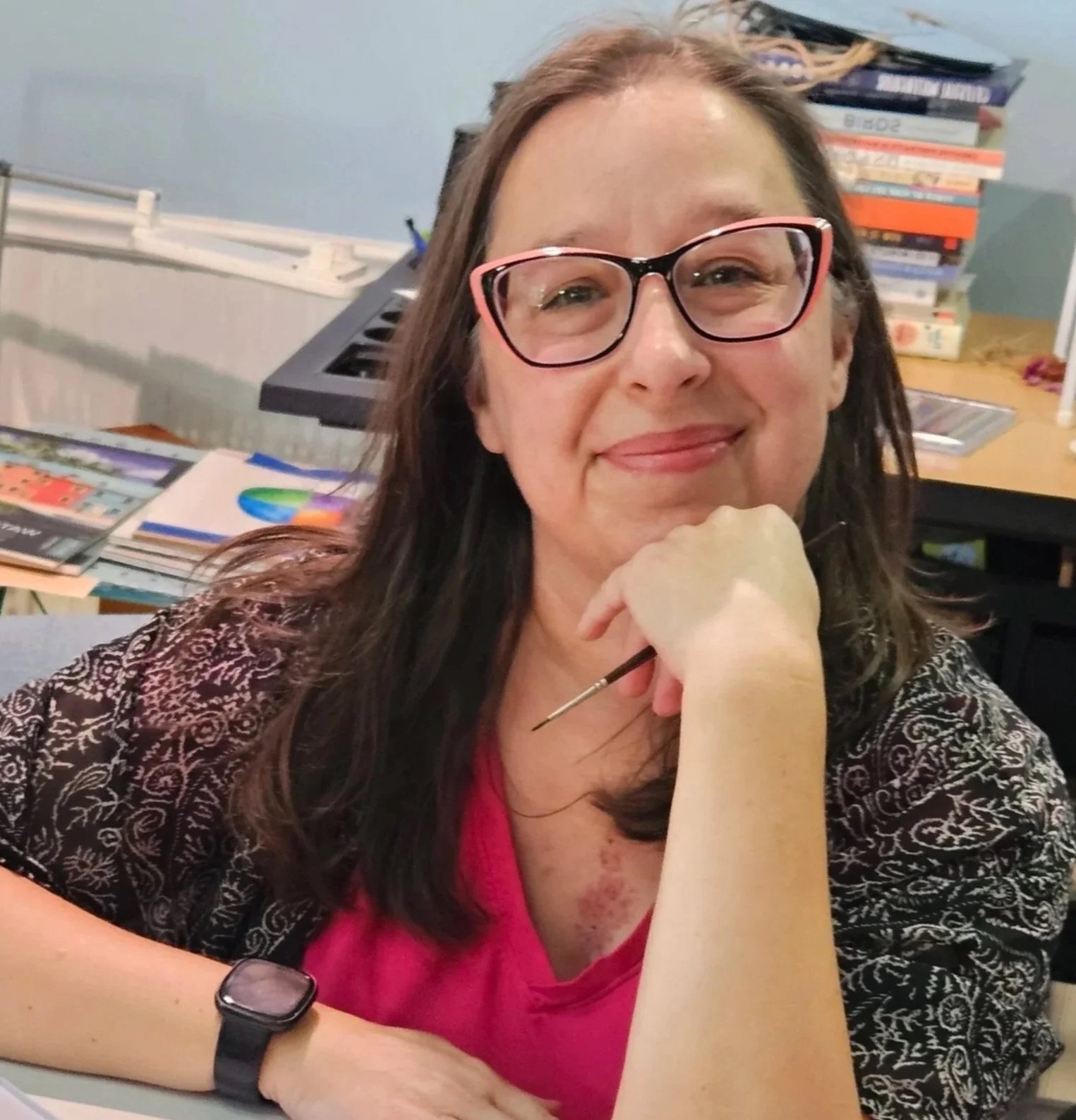 Photograph featuring the watercolor artist Christi  Doucet.