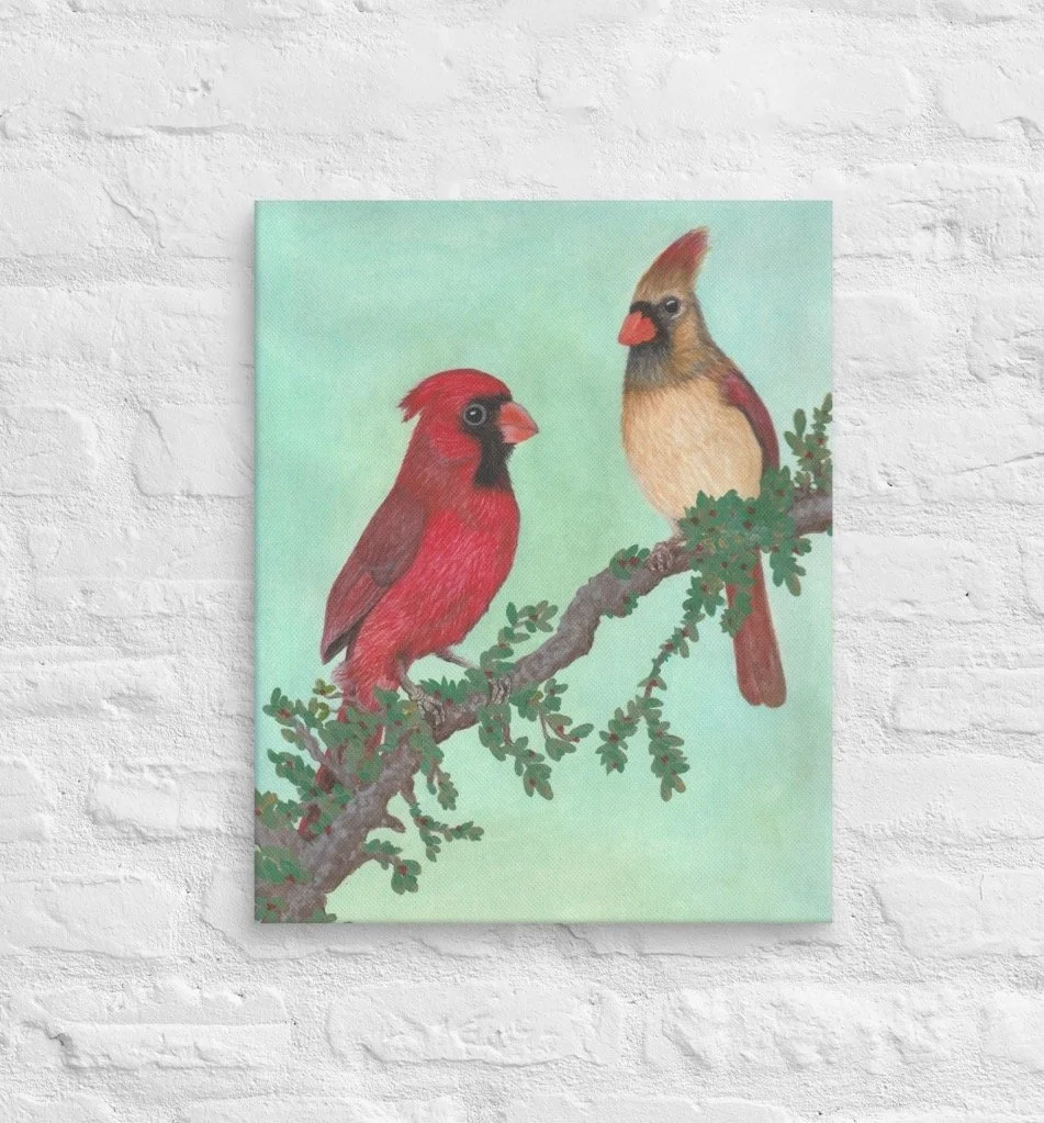 Canvas print of watercolor painting of male and female cardinal perched on a branch. Branch has leaves and berries. The background is a soft sage wash.