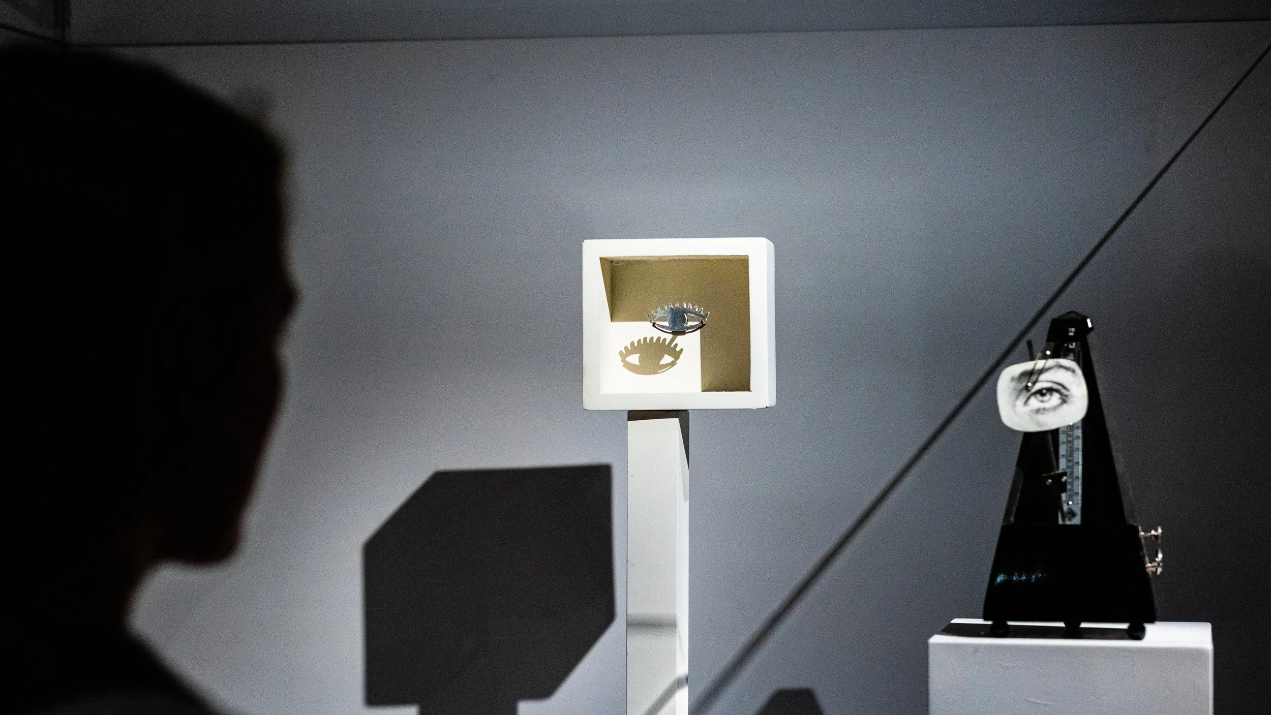 MoMu eye-metronome - Surrealist object display at MoMu Antwerp fashion museum, spatial photography by Shruti Mehta