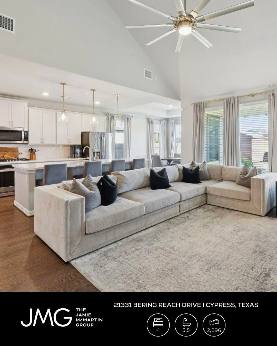 Better than new, this 2022 Ashton Woods home at 21331 Bering Reach Drive, blends modern style with smart upgrades, open living, surround sound, and a wall of windows framing the backyard.

The kitchen steals the show with quartz counters, farmhouse s
