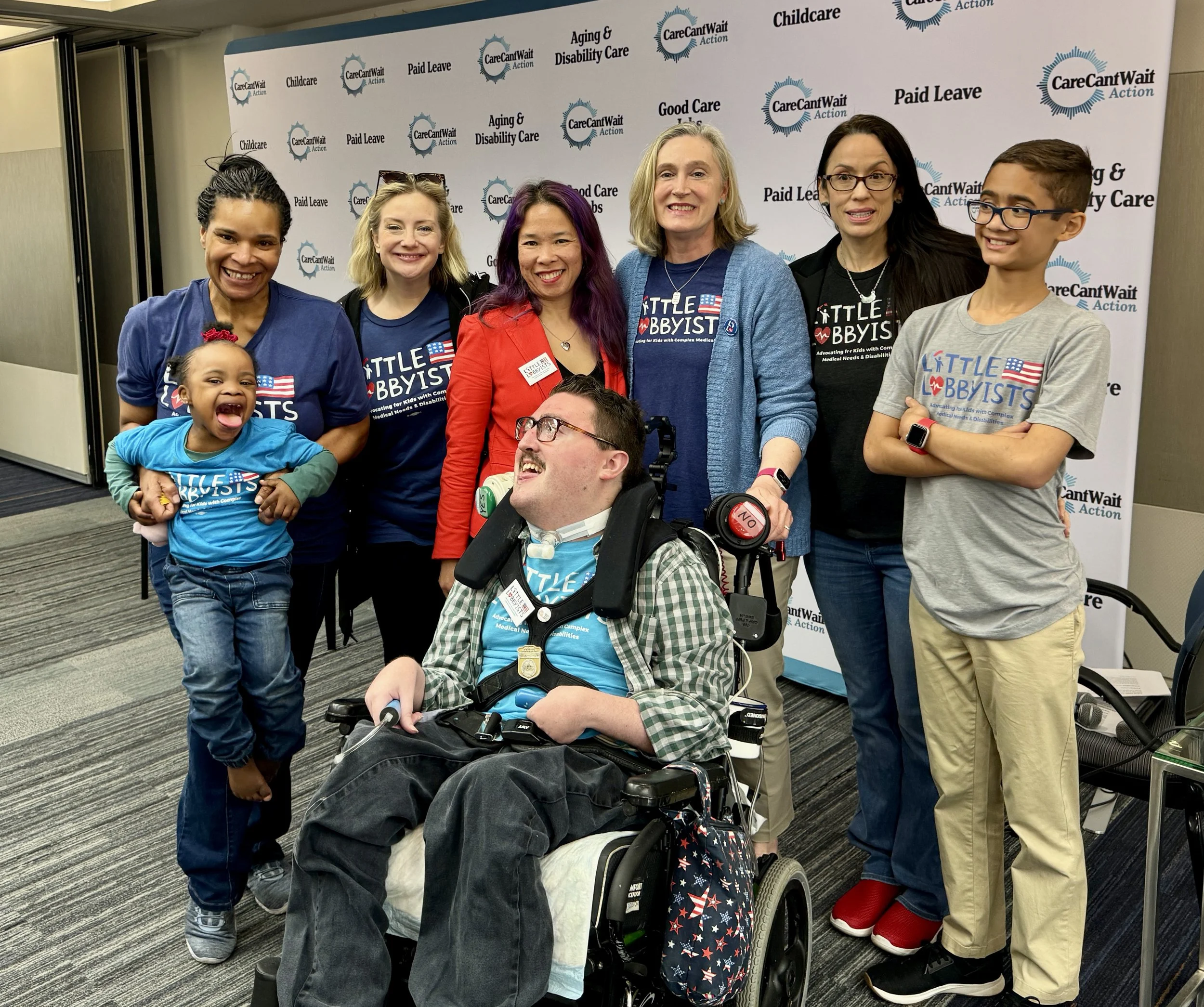 Rob poses with members of Little Lobbyists at a Care Coalition event