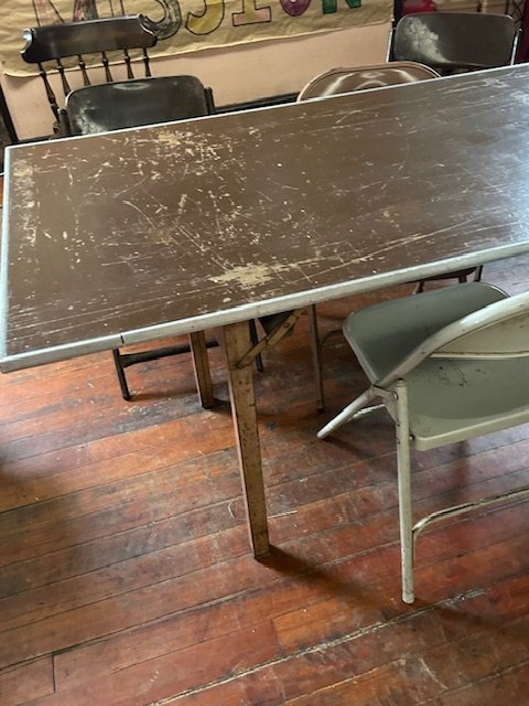 Old tables and chairs.