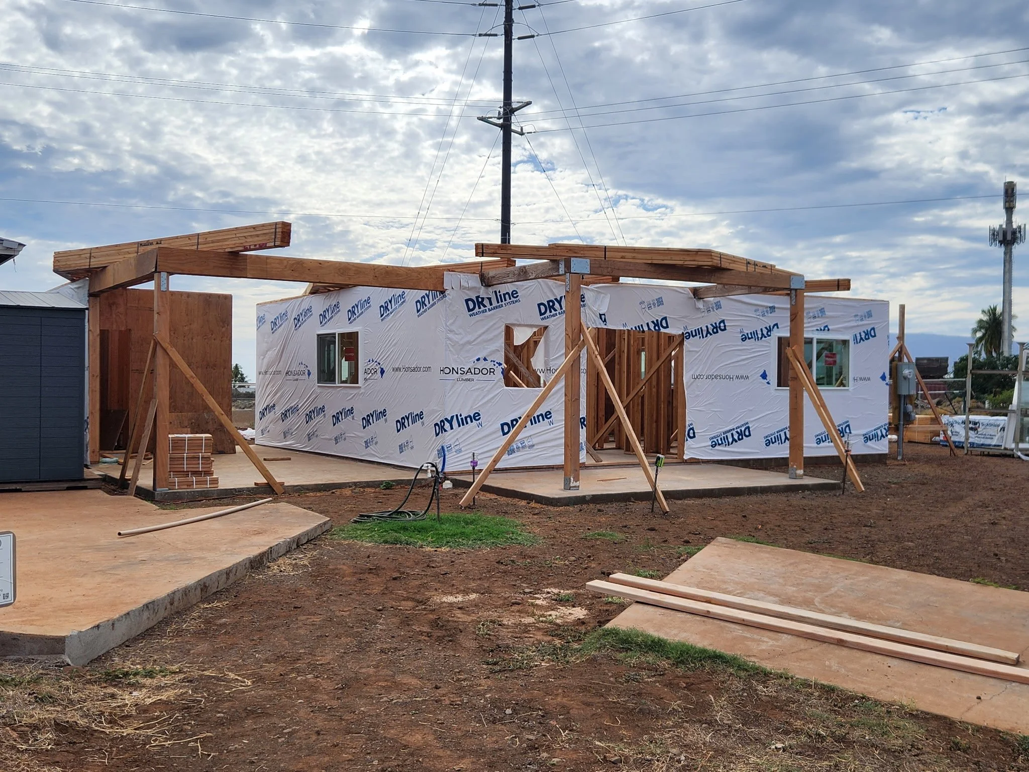A house we wrapped in Dryline and installed windows.JPG