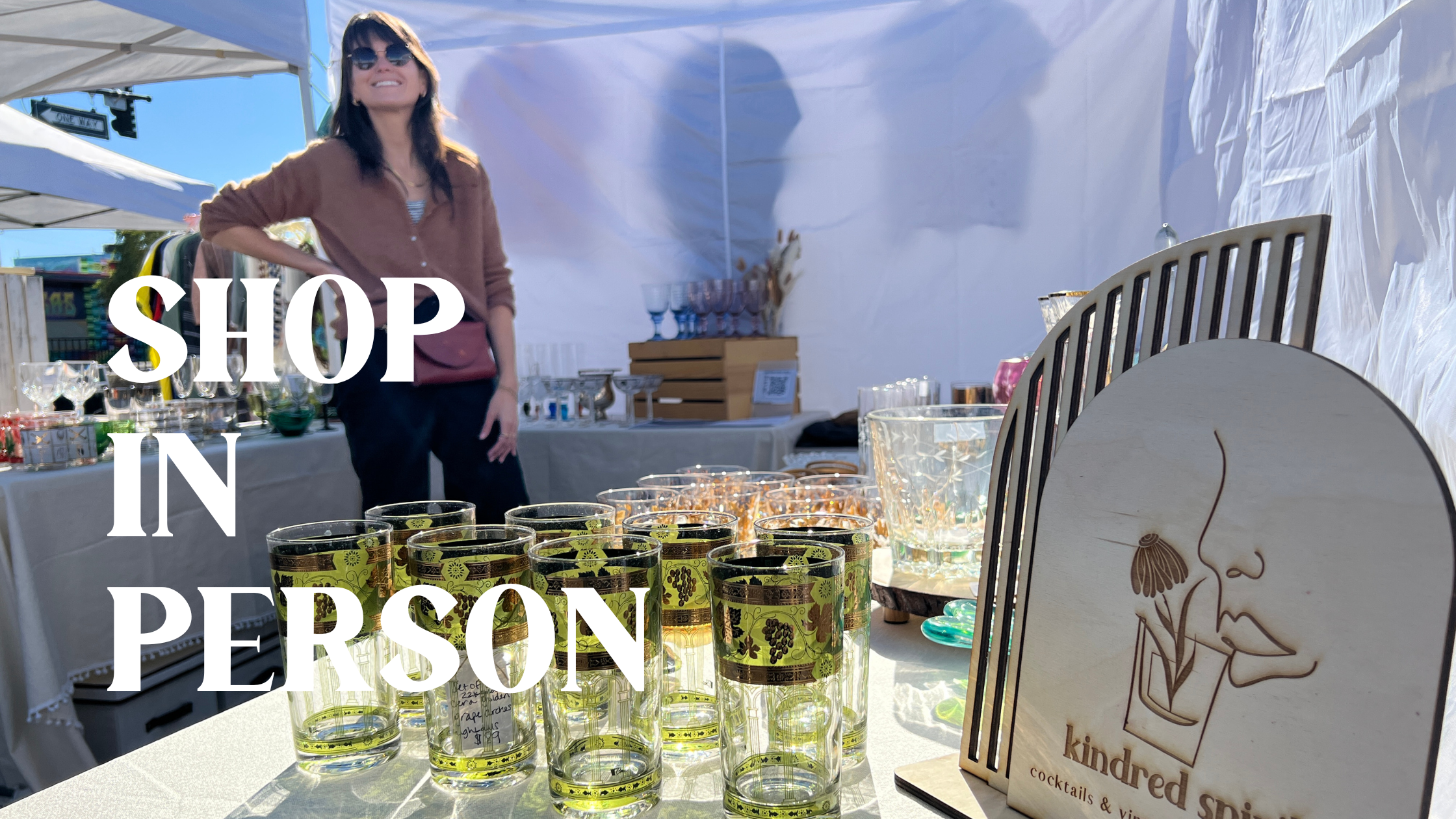 shop in person - market stall set up in back selling vintage glassware in las vegas nv 