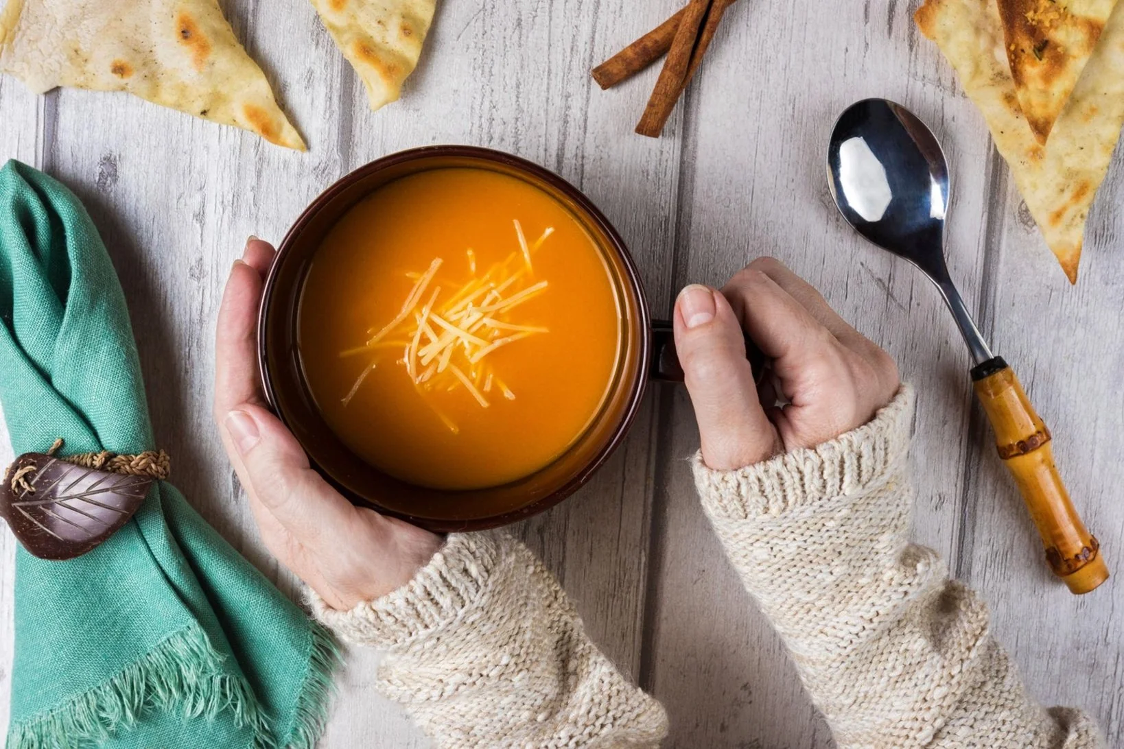 Warm nourishing meal in a rustic setting illustrating Ayurvedic digestion and why light meals can still feel heavy.