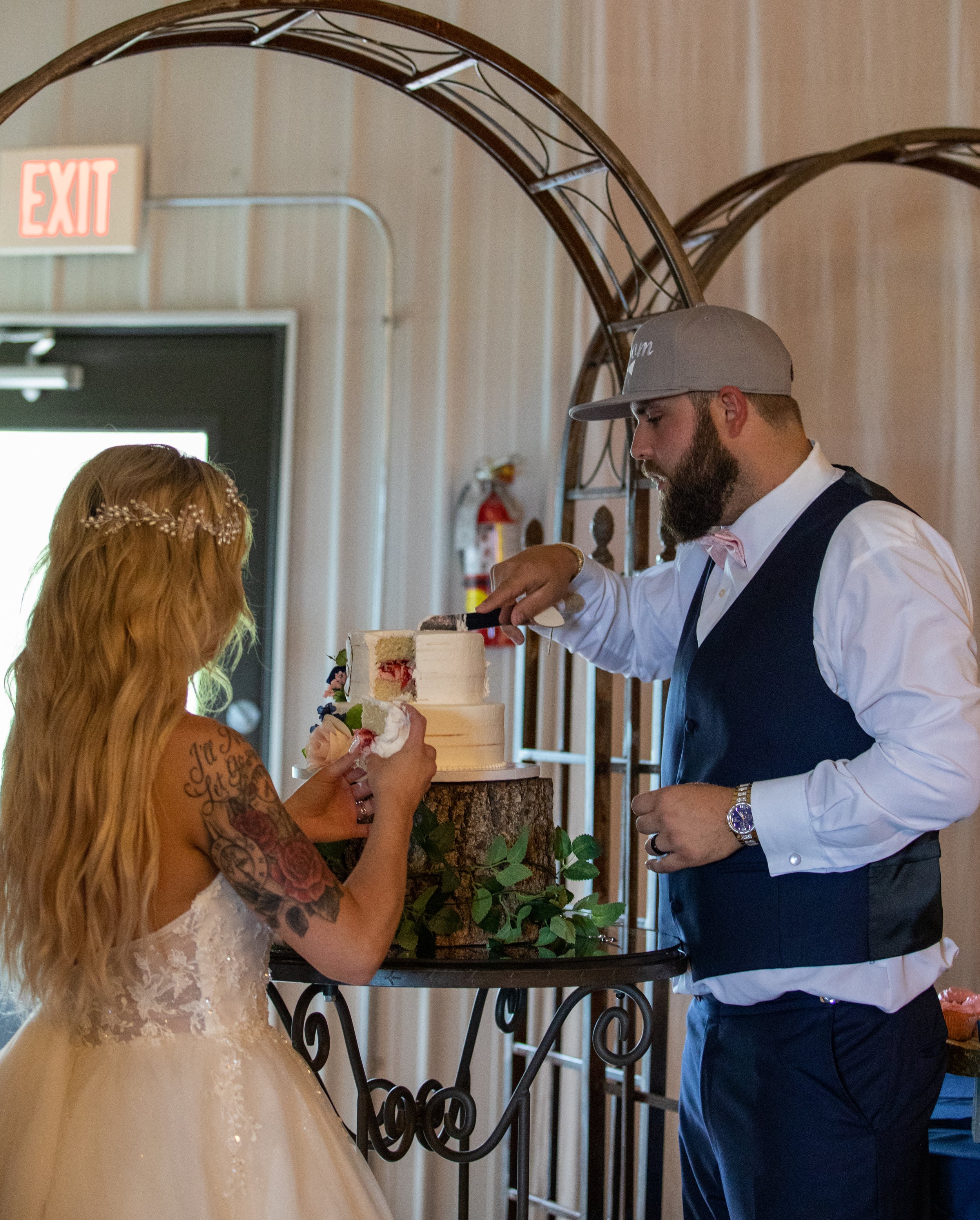 Norwalk Iowa Wedding Happy Apple Celebrations Bride and Groom Photo Cake Cutting