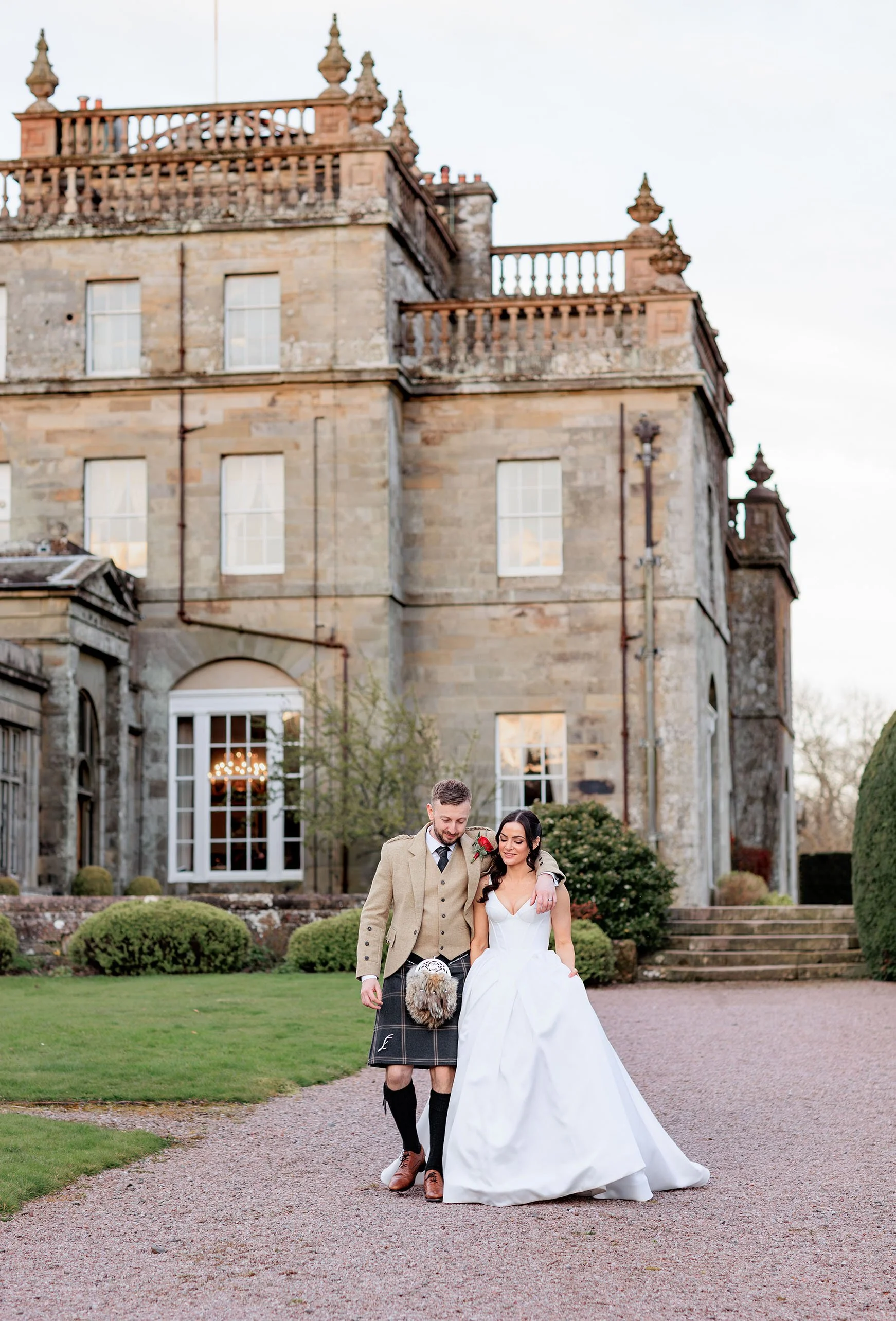 Bride at window looking down