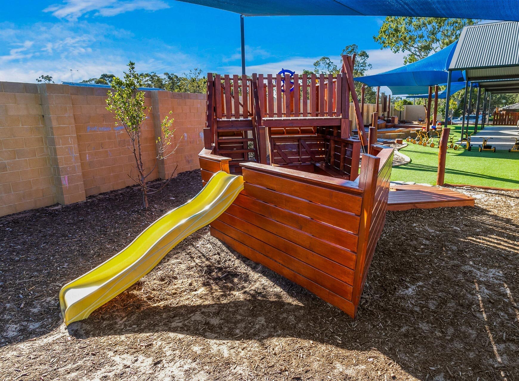Slide in Shaded Sandpit Area at Cuddles Byford