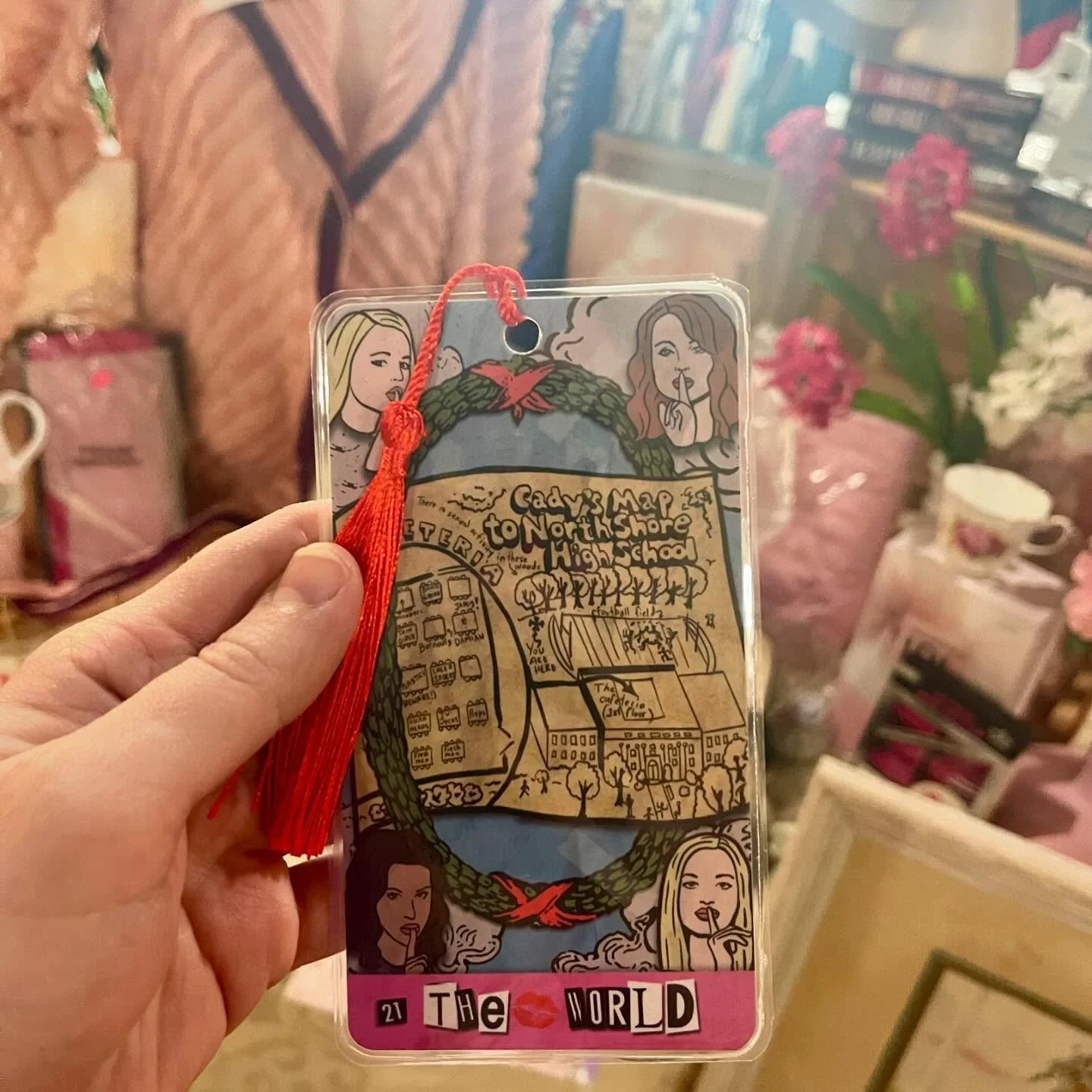 On Wednesdays, we wear pink 🩷👄👩&zwj;🎤💅👚👙👛🌸🎀 check out the Plastic Oracle (mean girls inspired) bookmarks and more at my product table at @thedoggiebagresaleshop! Friday is the last day of January and my last day set up at the shop. Remember