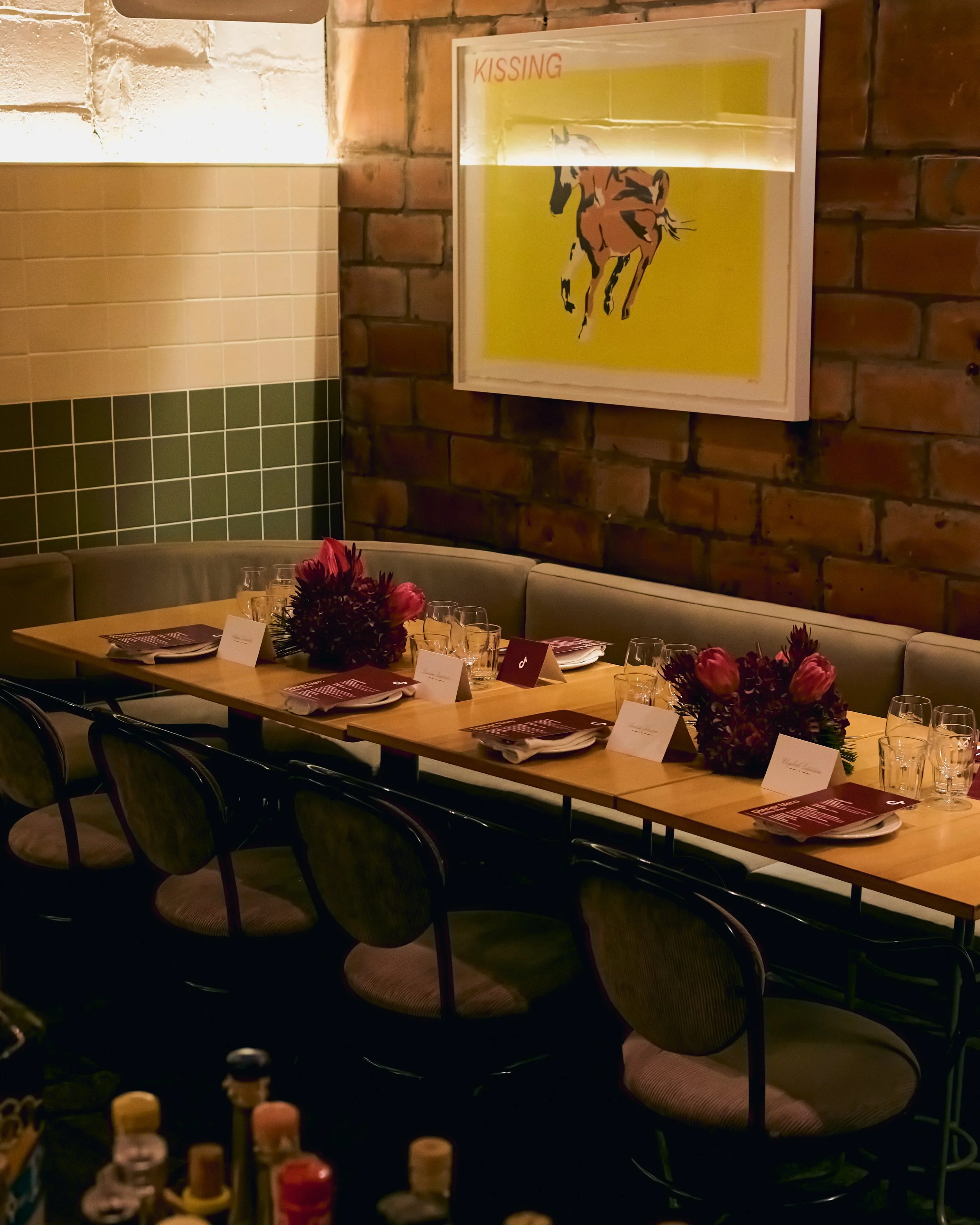 A table at GIA GIA showcasing the floral design by Asher Fleurs for Tik Tok's Holiday Event