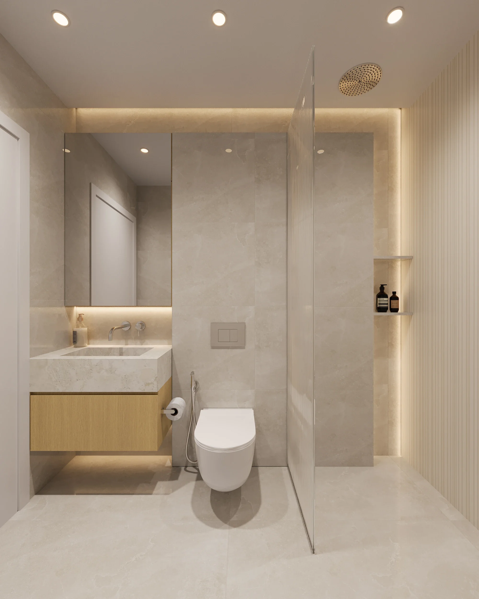Modern bathroom with neutral tones, wall-mounted toilet, a small vanity with a sink, mirrors, a glass partition, and built-in shelves with decor bottles.