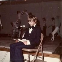 In 5th grade, narrating a modern dance production of Journey to the Centre of the Earth with music by Rick Wakeman (keyboardist for Yes). I got to read the Richard Burton narration.