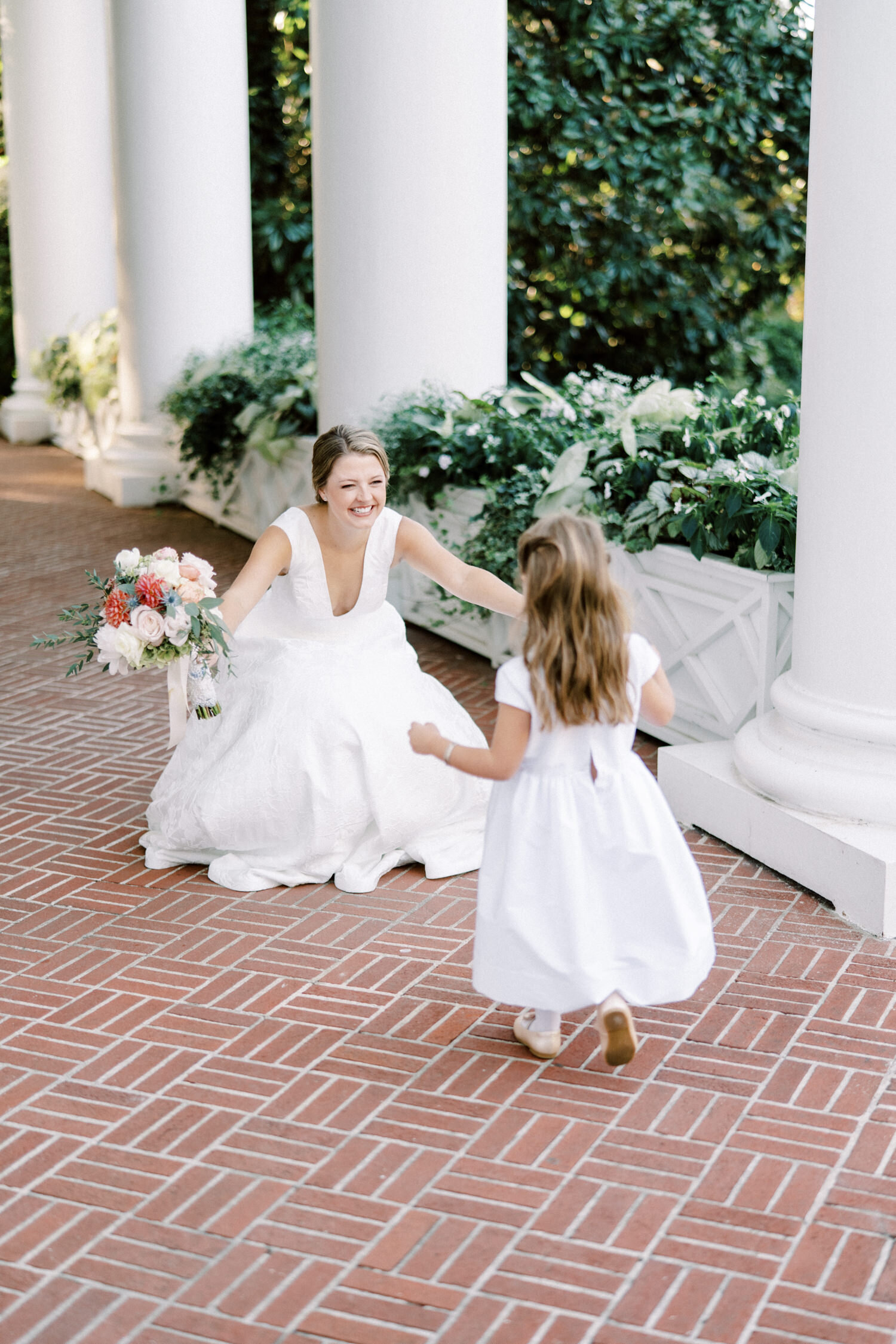 flower girl and bride at Duke Mansion