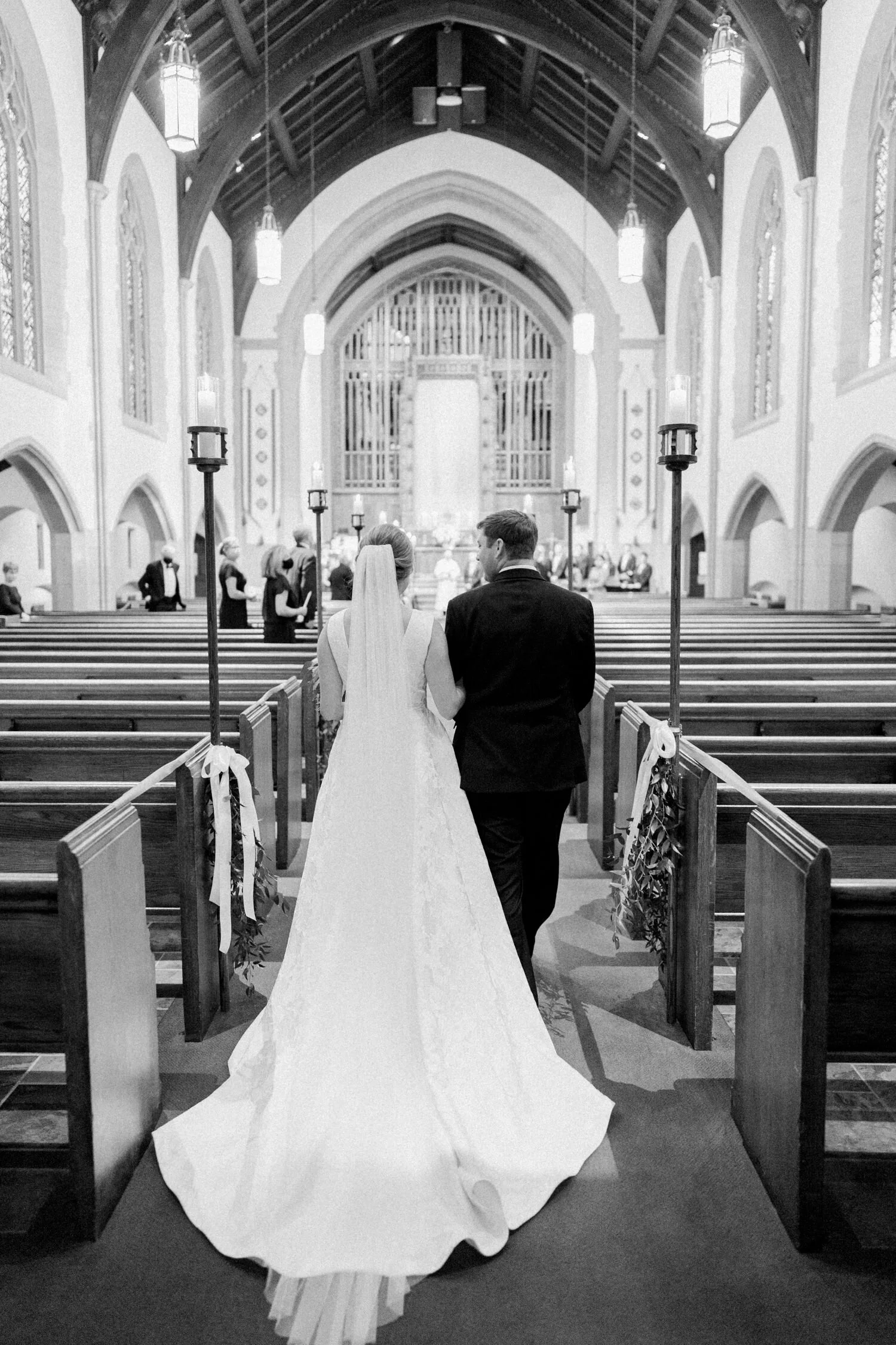 a bride processes during her ceremony at Myers Park Methodist Church 