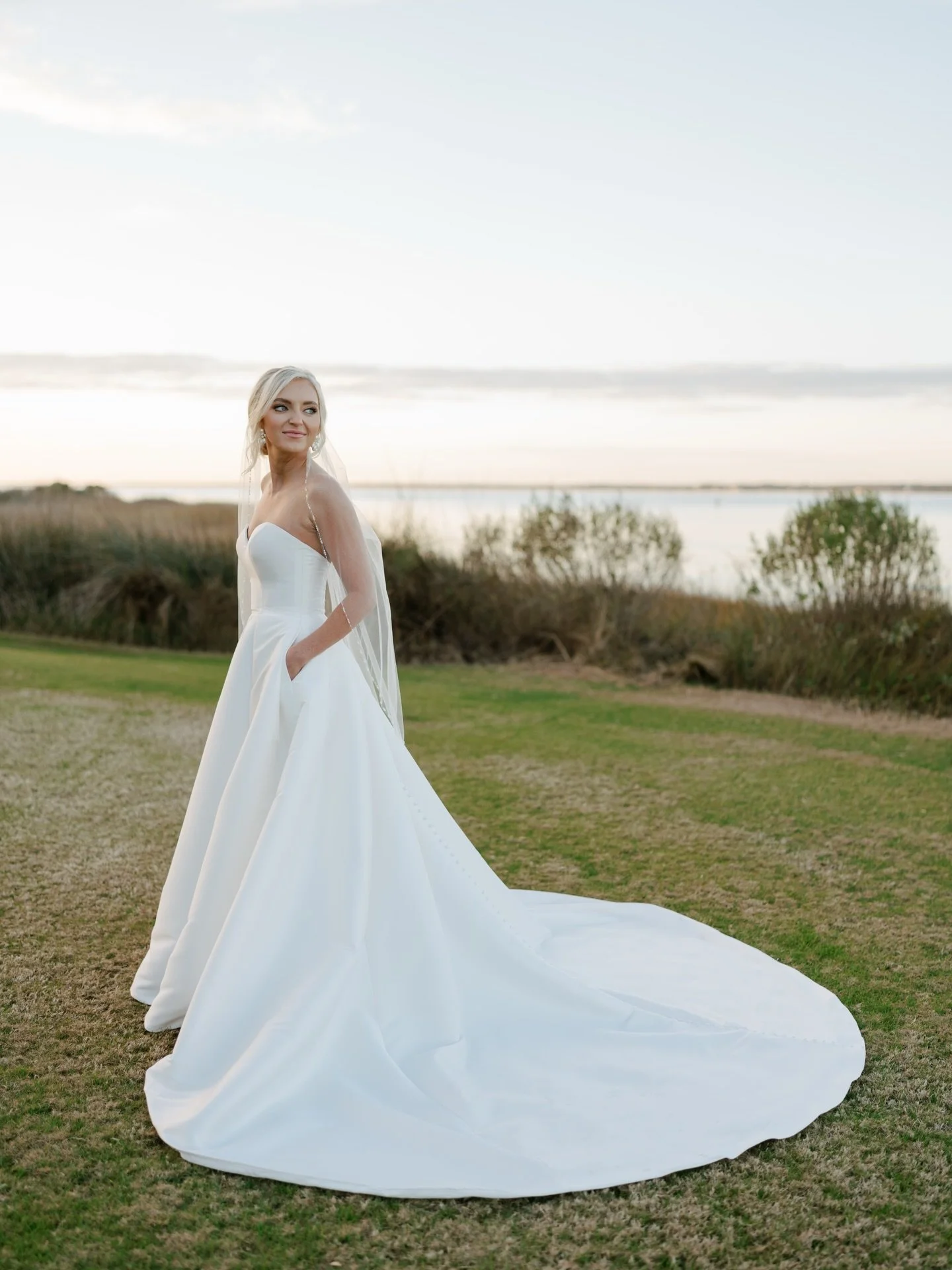 Easiest way to get a natural reaction for a bridal portrait? Put her partner right in her eye-line. Nicole + Joe are the sweetest together ✨

#crystalcoastcountryclub #carolinawedding #coastalweddingphotographer