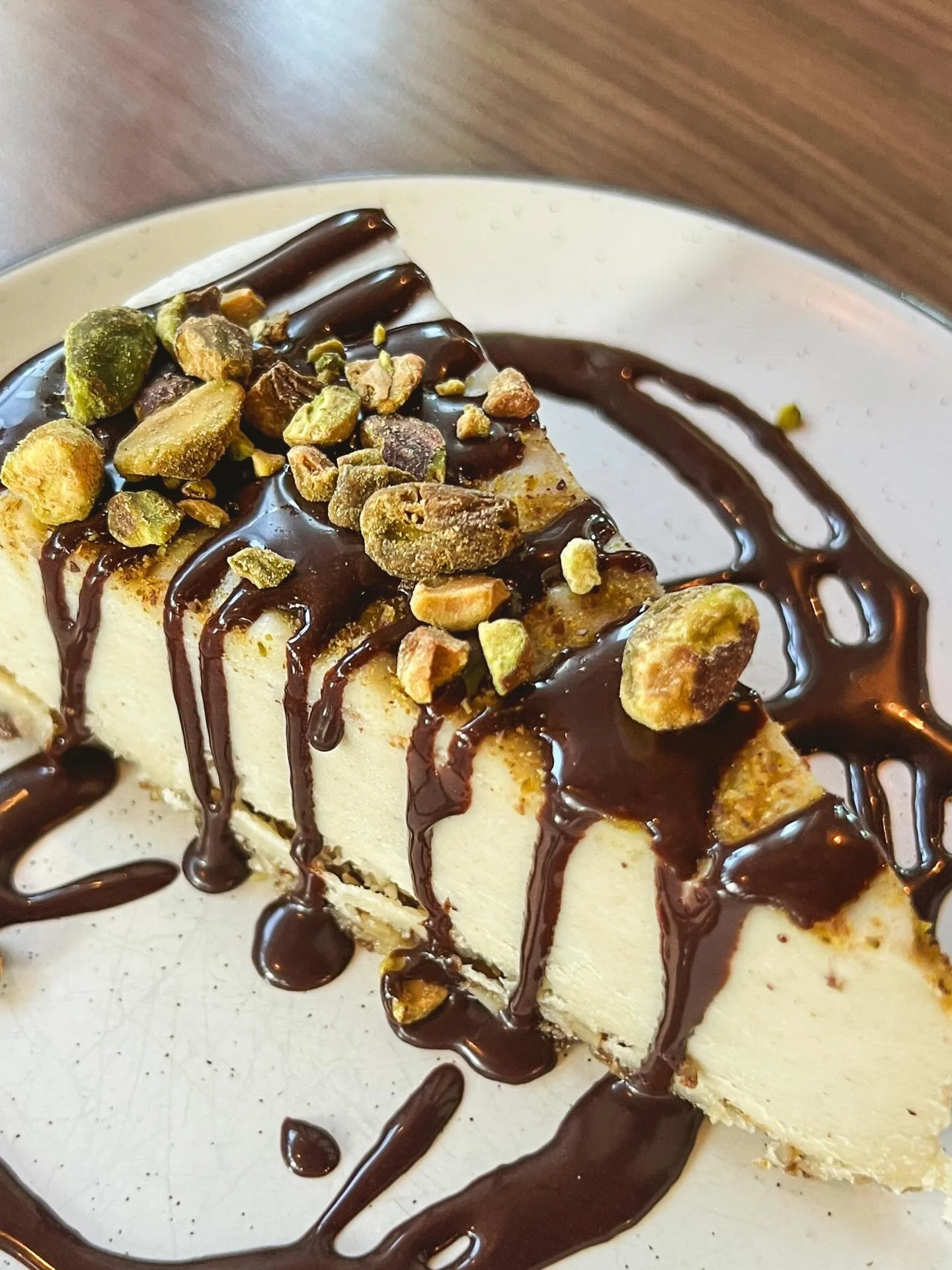 Celebrate the last day of 2025 with a slice of our Pistachio Cashew Chzcake! 💚