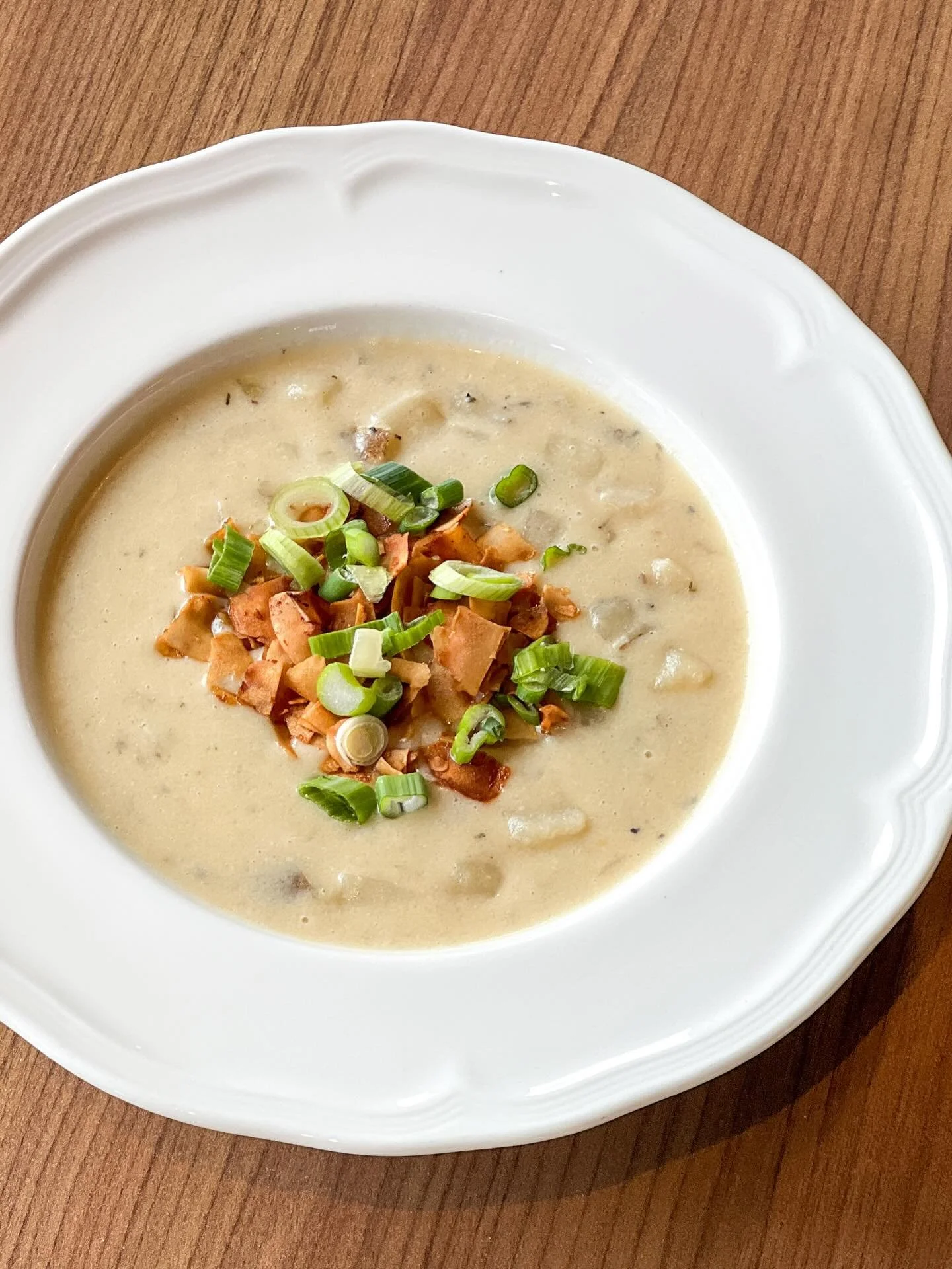 Now serving: Creamy Potato Soup with coconut bacon and green onions 🥣