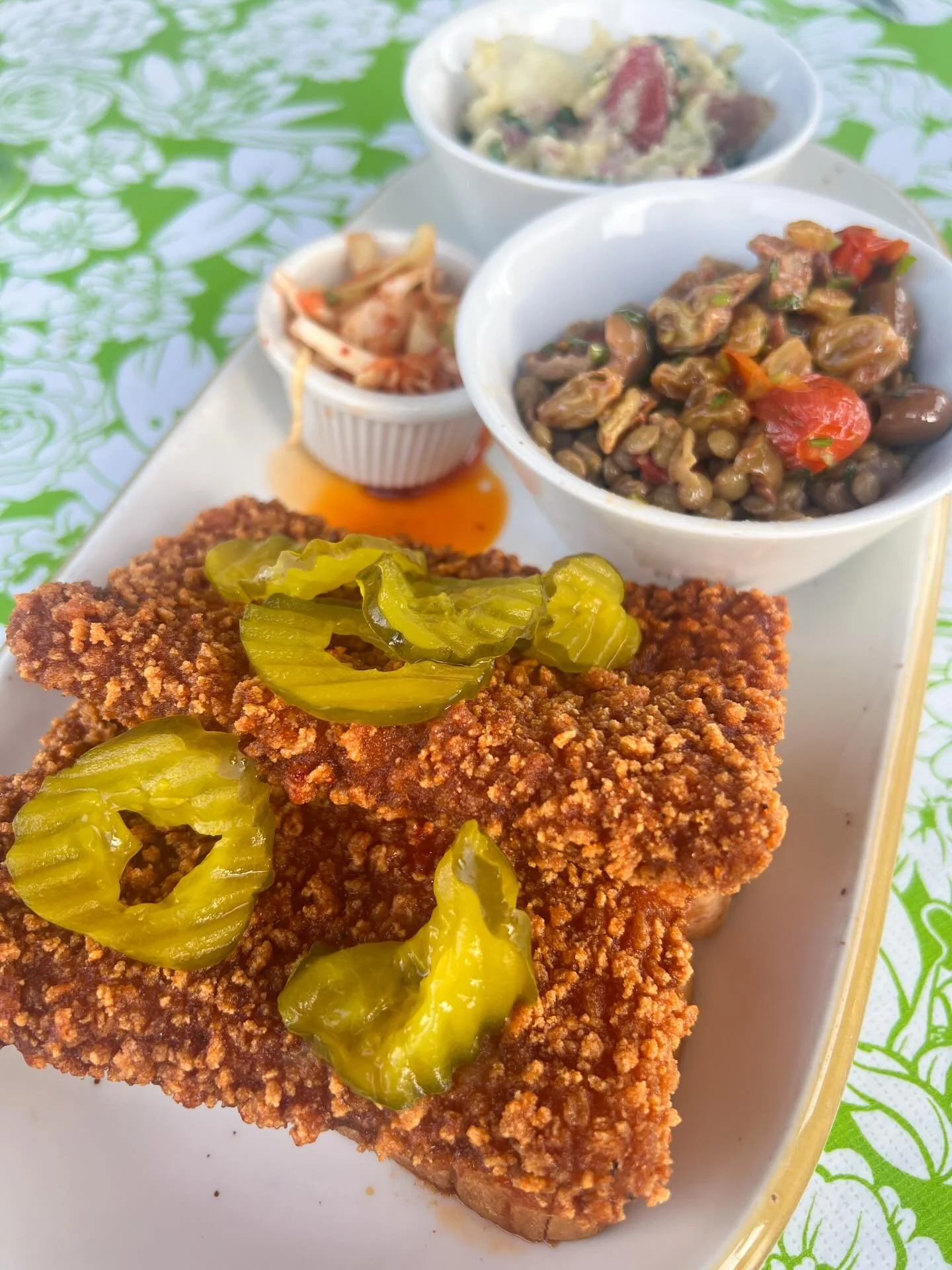 Most popular item on the new menu right now? 🔥 HOT CHKN PLATE featuring 2 hot tofu katsu and potato salad and lentil salad. You get to pick from 8 different sides 😎