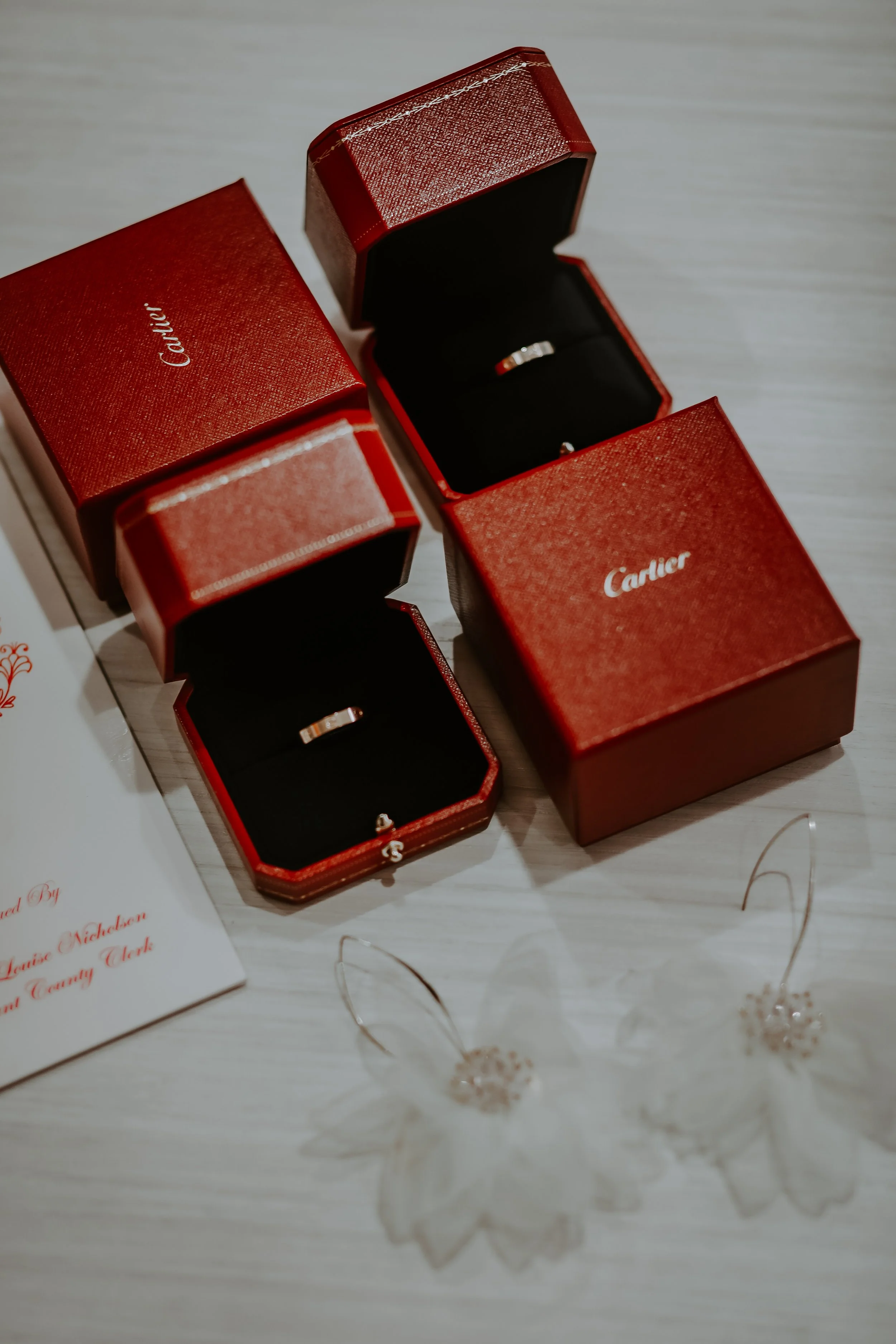 Red fancy jewelry boxes and earrings