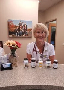 Dr-Lisa-and-Supplements1-214x300.jpeg