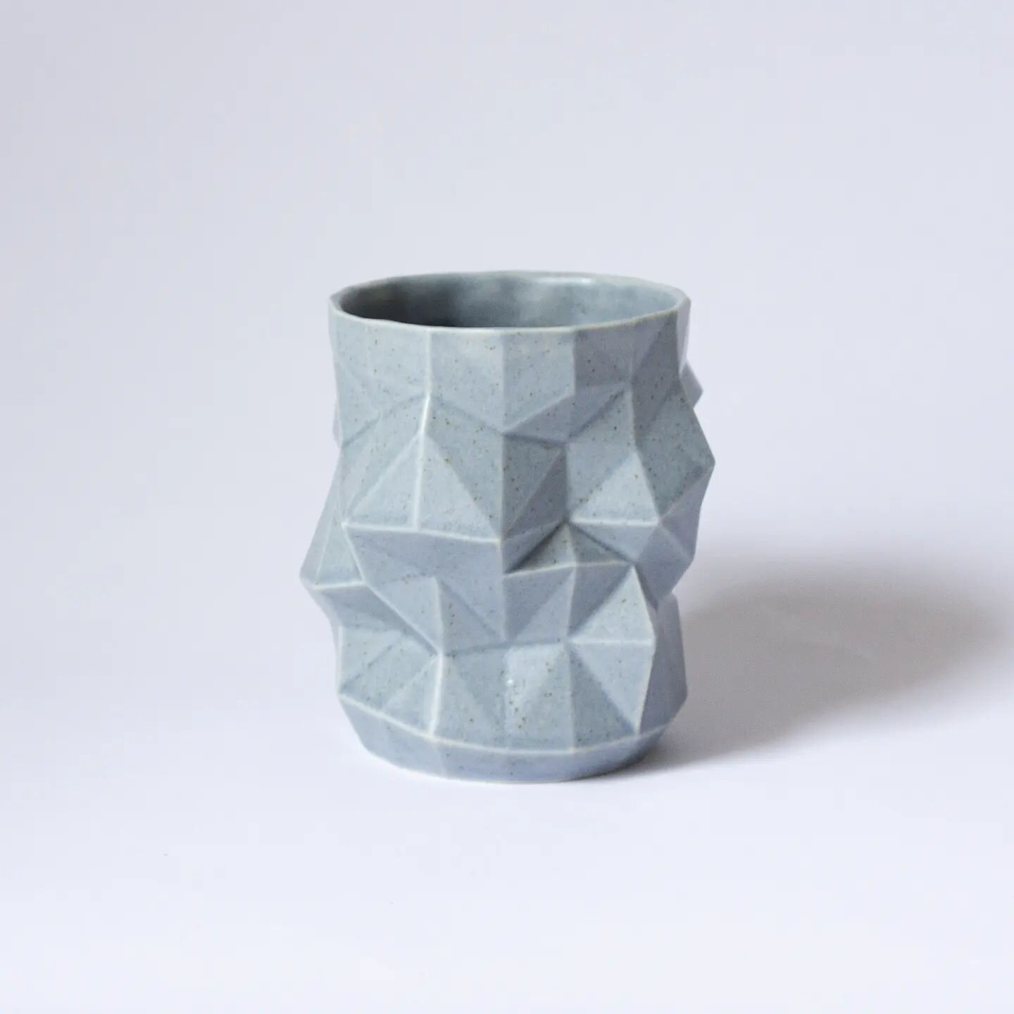 Squashed Geometry (front view)

Individual Cup, 

Satin blue/grey/green glaze

Dishwasher microwave and awesome safe. 

Currently I don't have any individual versions of these available on my website but if you would like one or this one. Just send a