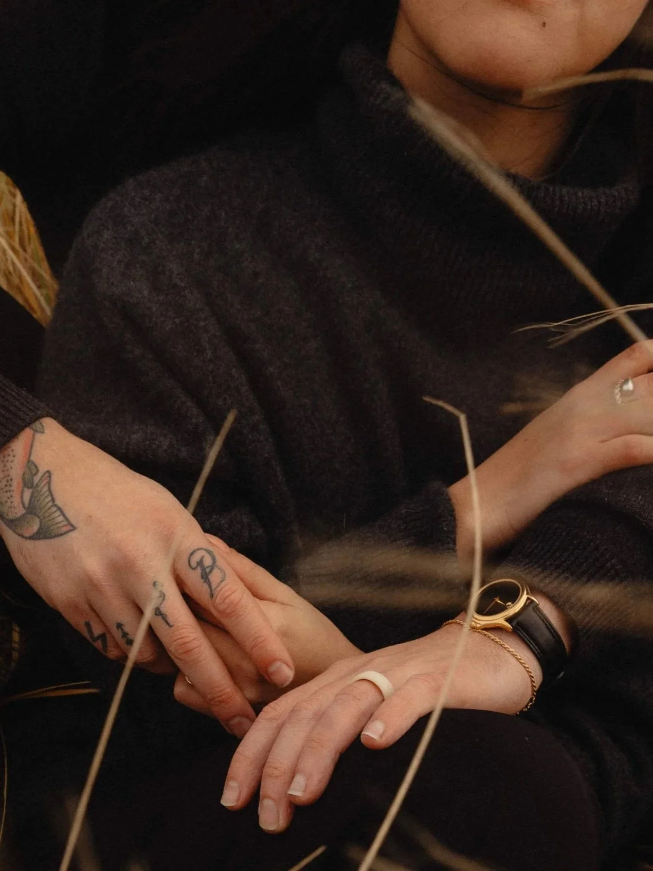 Couple holding hands at Oregon Coast engagement photography