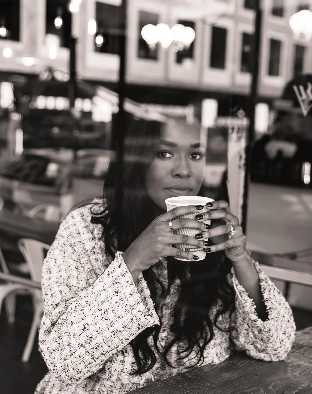Portrait of woman in a coffee shop by Oregon Photographer