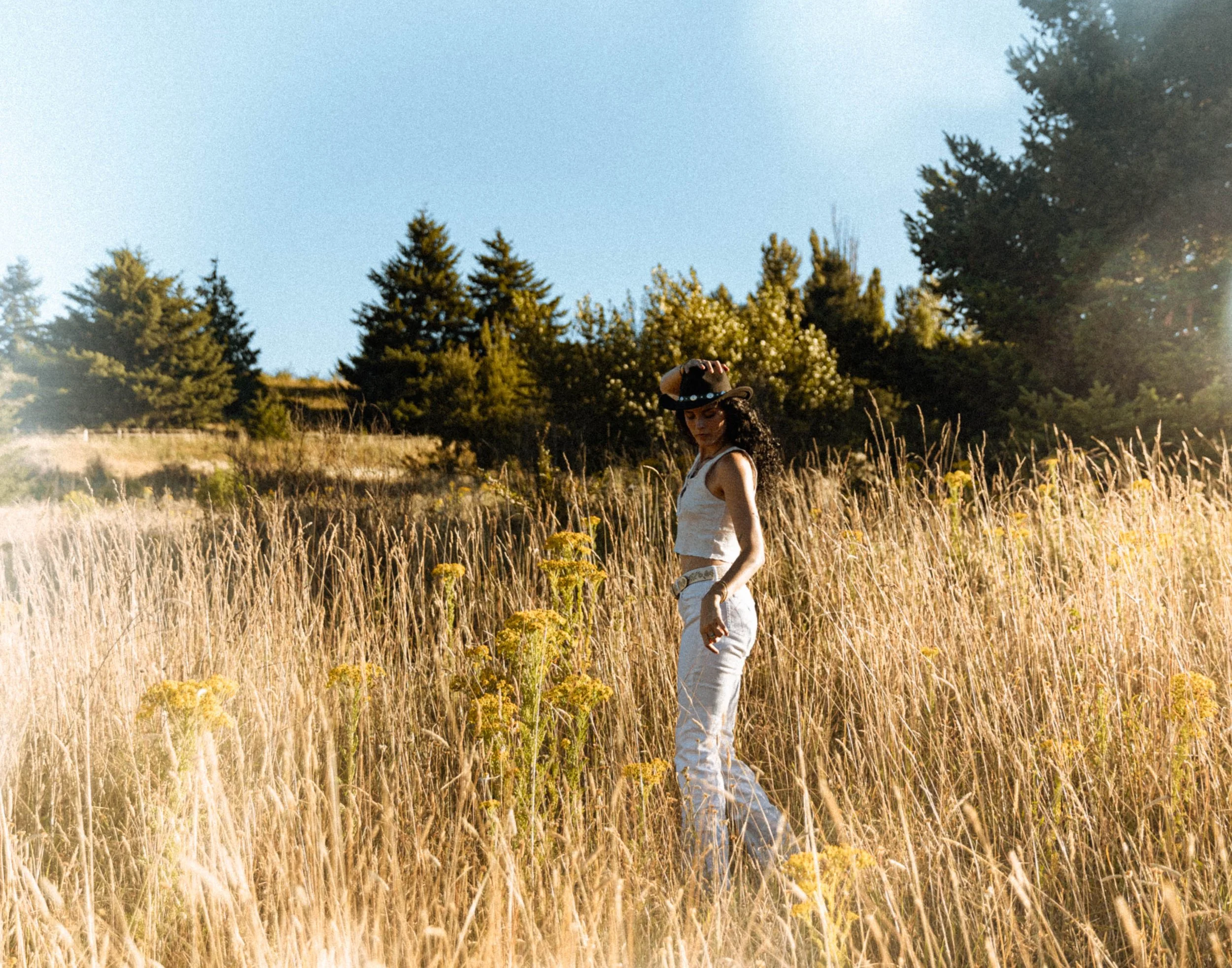 Woman in a field during a portrait photography session