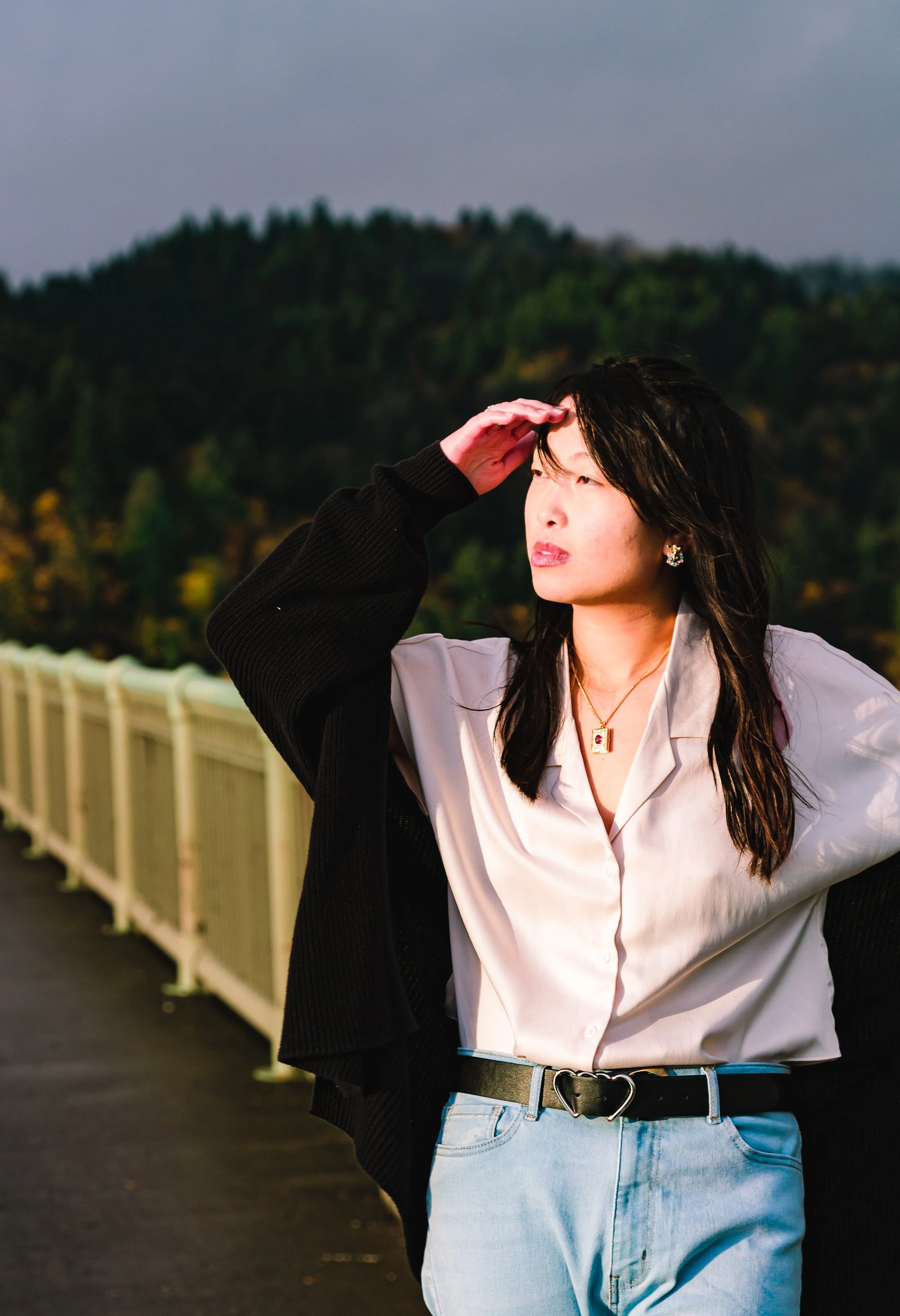 Woman on St. Johns bridge by Oregon Photographer