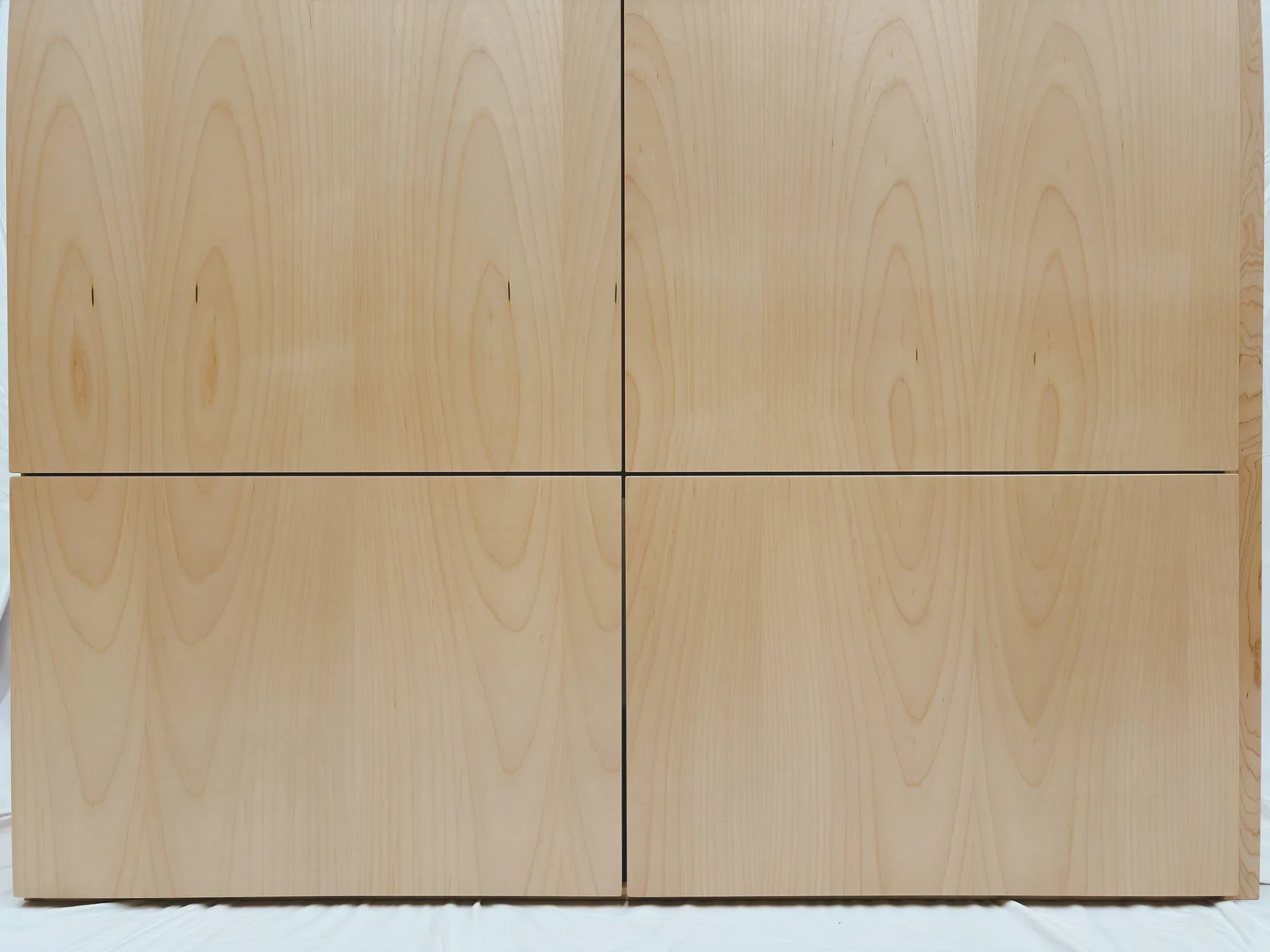 Wall of custom basement storage cabinetry in a Baltimore home