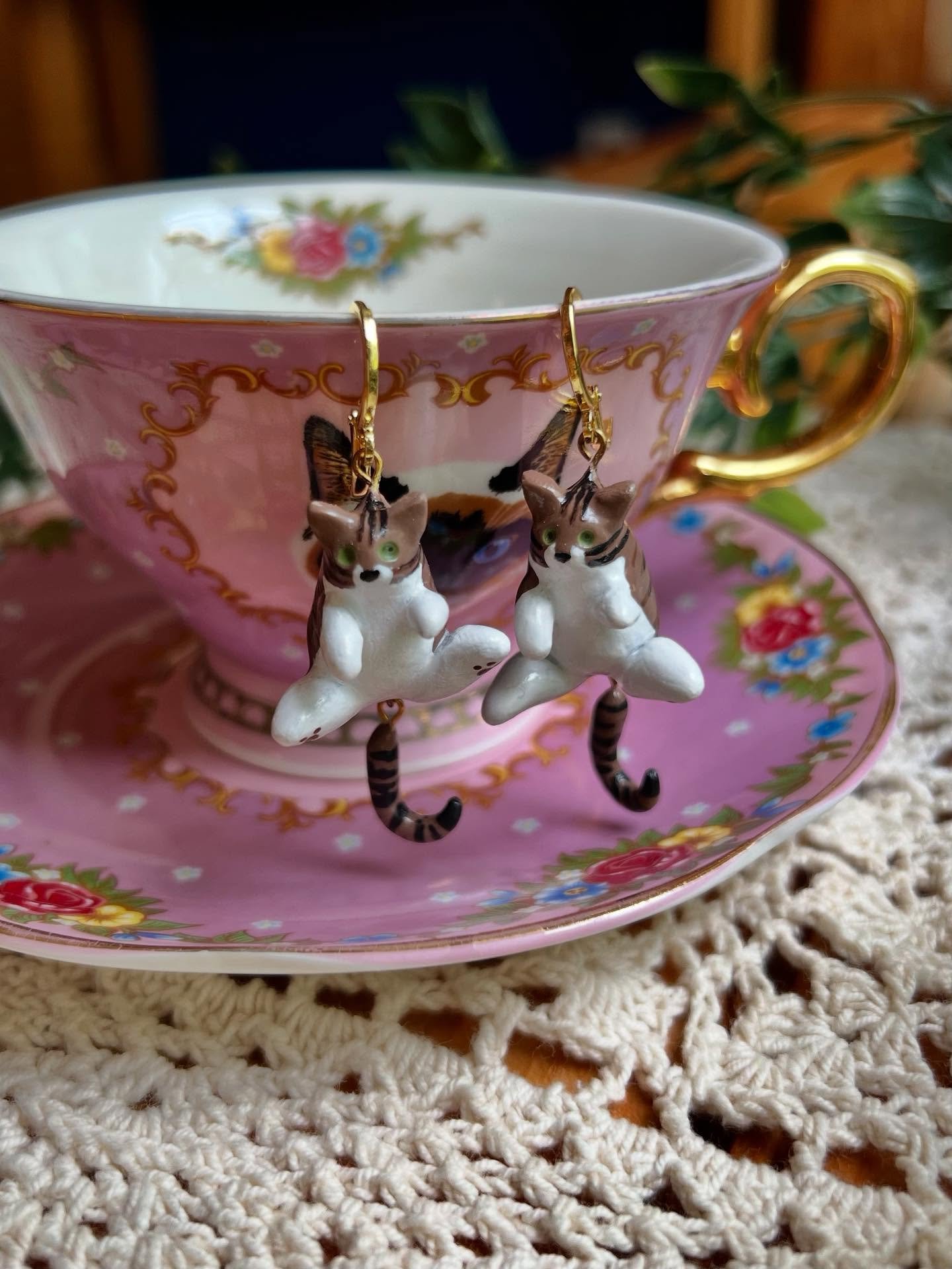 A pair of custom kitty earrings I made a little while back 🐾
