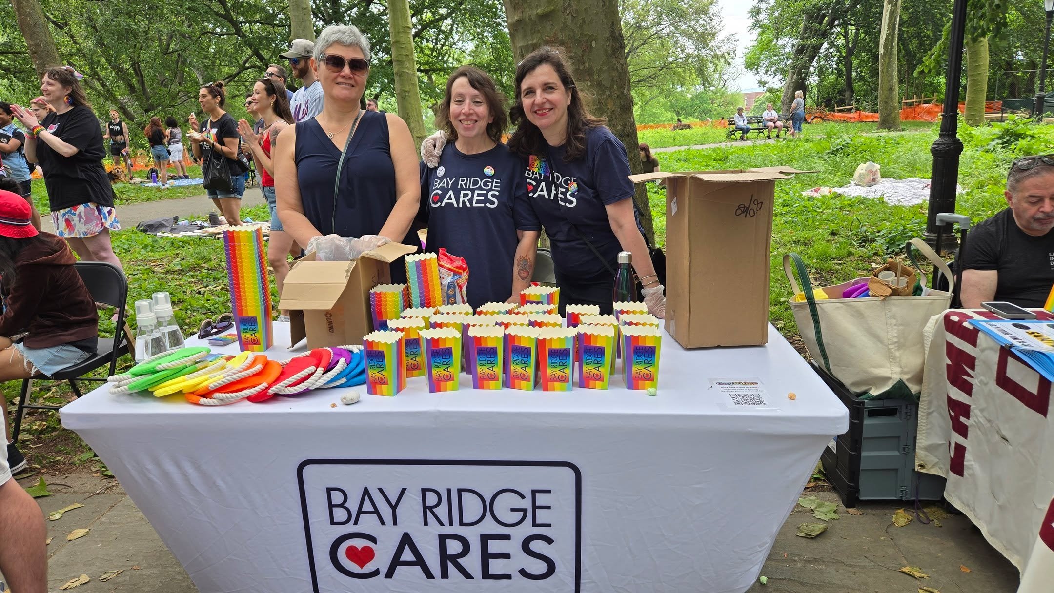 π What a Pride-filled day in Owl’s Head Park! Bay Ridge Cares was thrilled to support our friends at @gayridge during their incredible Pride event. We handed out hundreds of boxes of Pride Popcorn to our neighbors—and made sure all the f