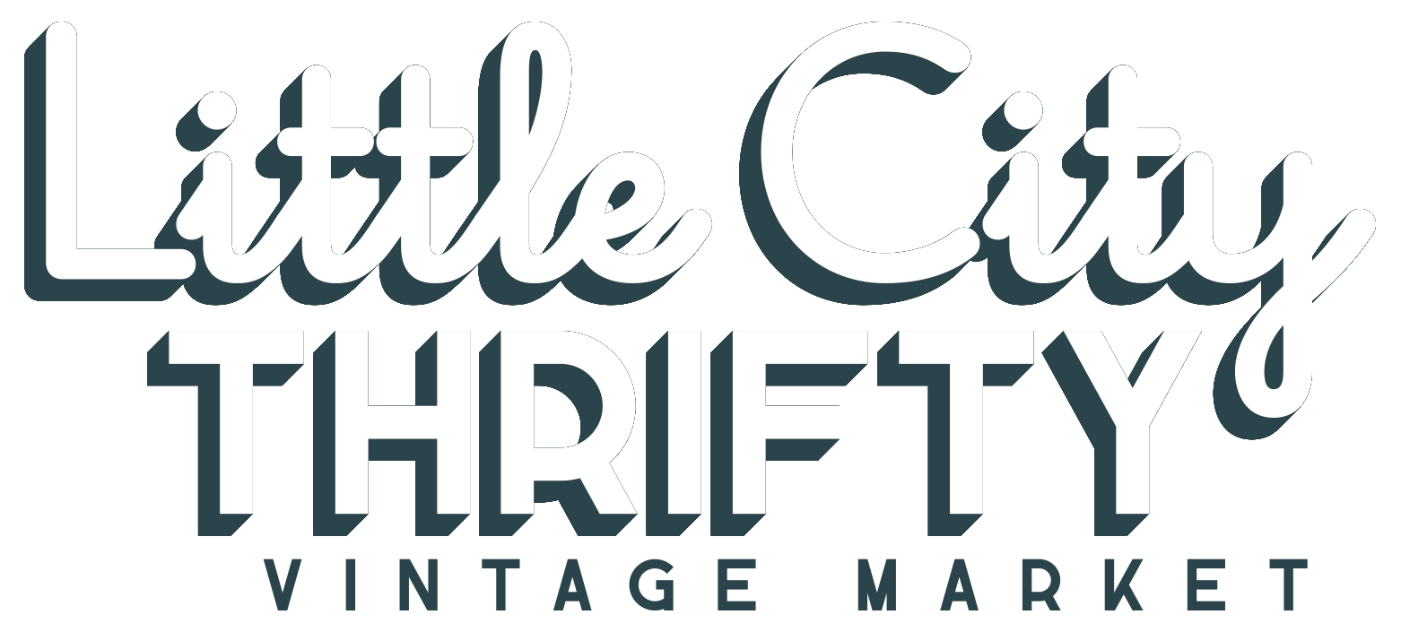 Logo for Little City Thrift, Vintage Market with stylized text in white and blue.