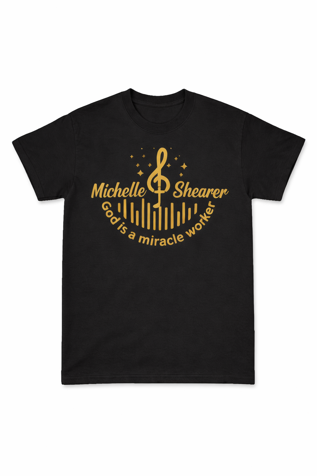 Black “God is a miracle worker” t-shirt by Michelle Shearer with gold design on front displayed on white background