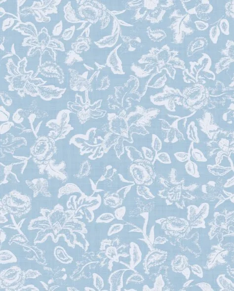 Light blue fabric with white floral lace pattern