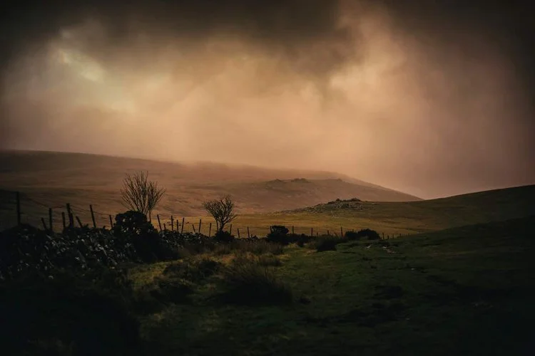 Shelstone Tor and Black Tor in the driving rain