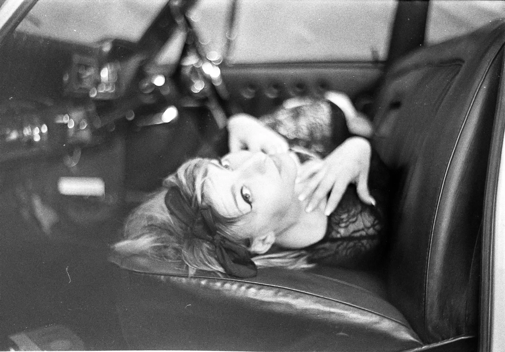 Chelsea in a vintage car, trying to recreate a nostalgic feel by shooting on black and white film
