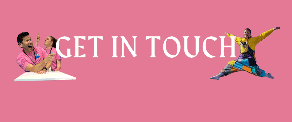 Get in touch header. Staff members acting fun and playful around the text.