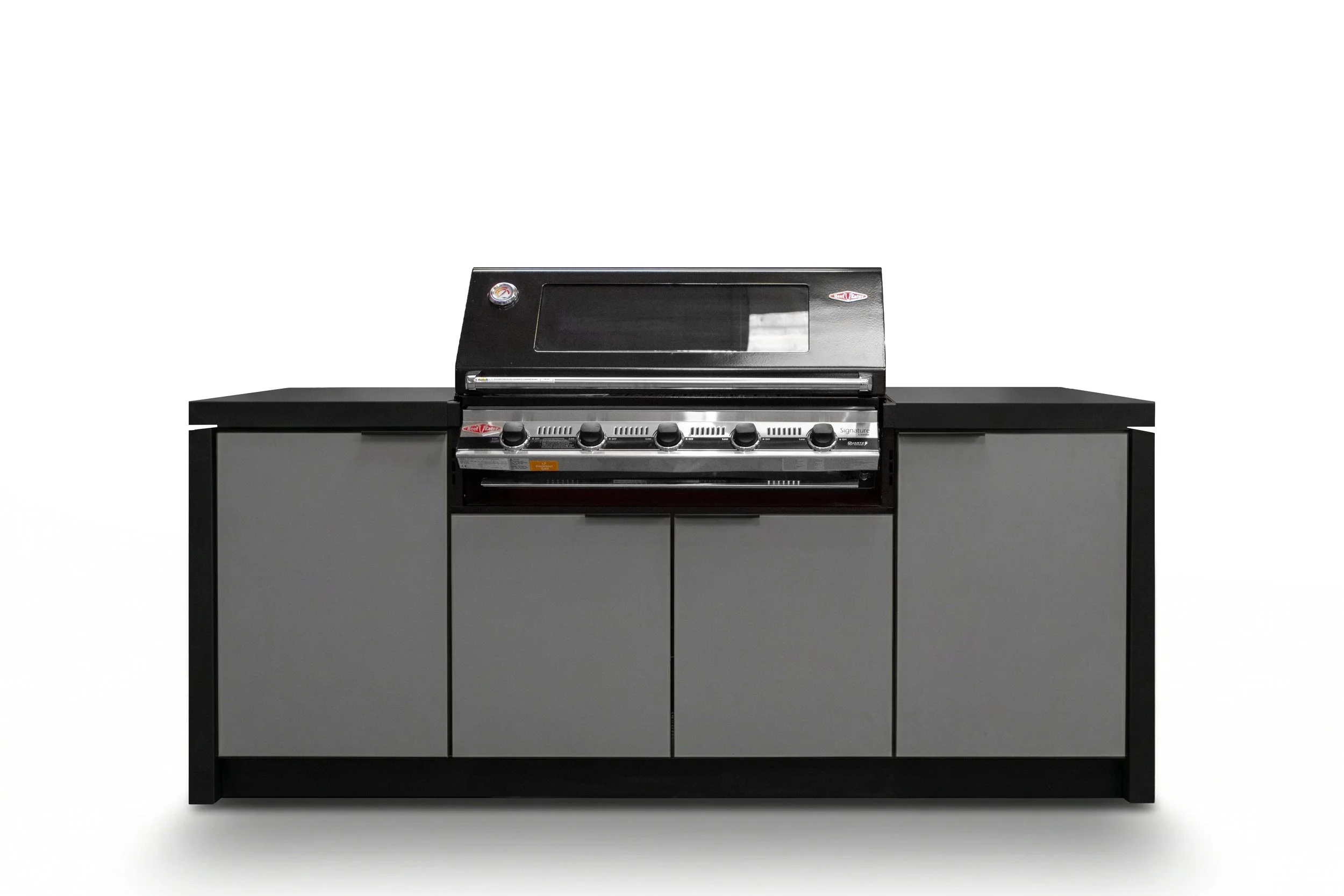 A modern black and gray outdoor grill with a transparent cover, four control knobs, and side cabinets, standing on a white background.
