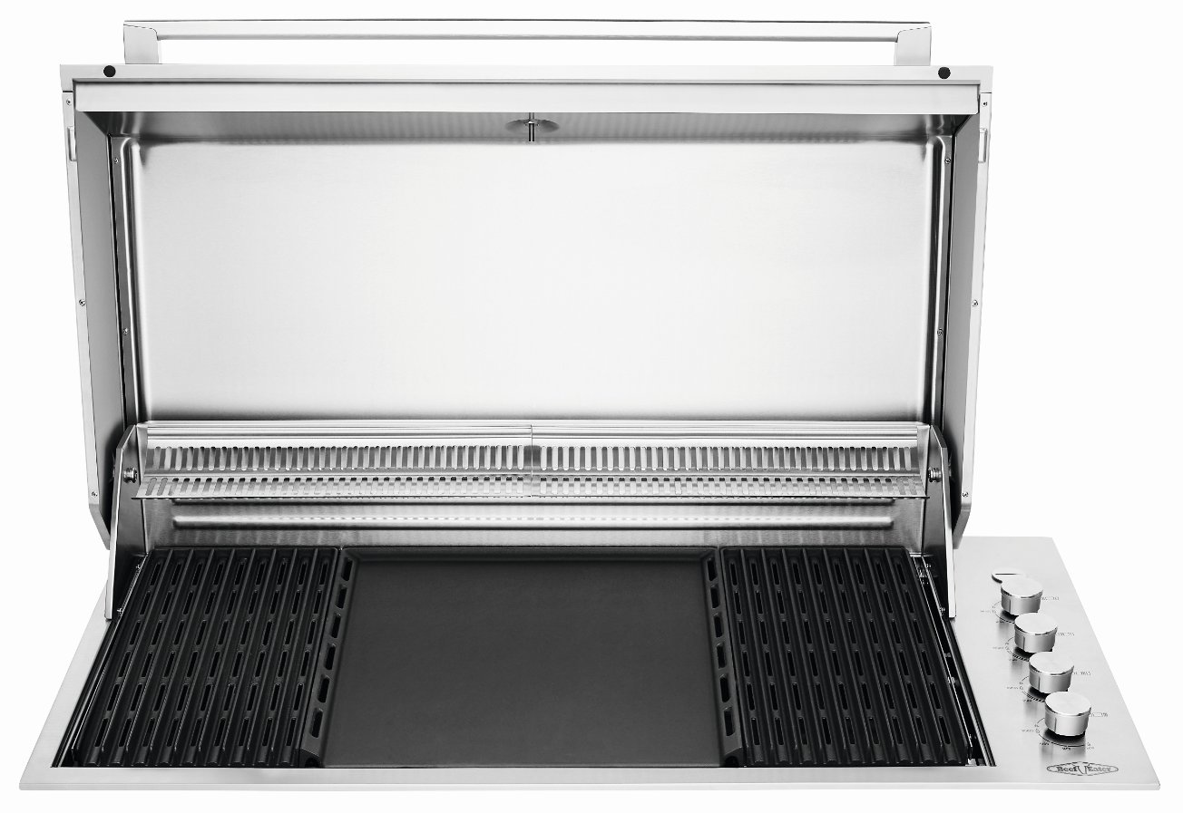 Stainless steel built-in gas grill with four control knobs on the right and a lid open to reveal the cooking surface.