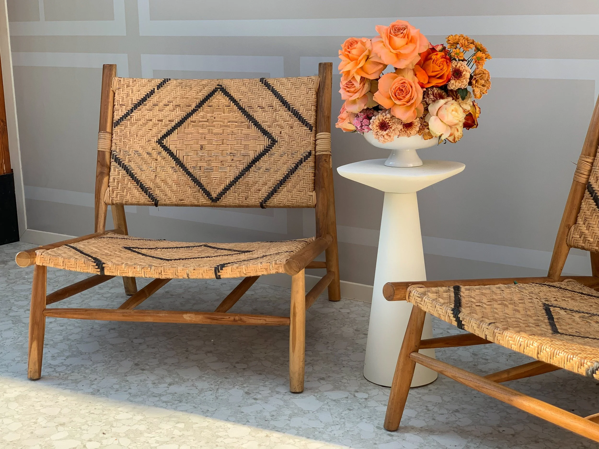 Outdoor seating styled with floral decor at Amazon Le Pantiero, Cannes Lions Festival